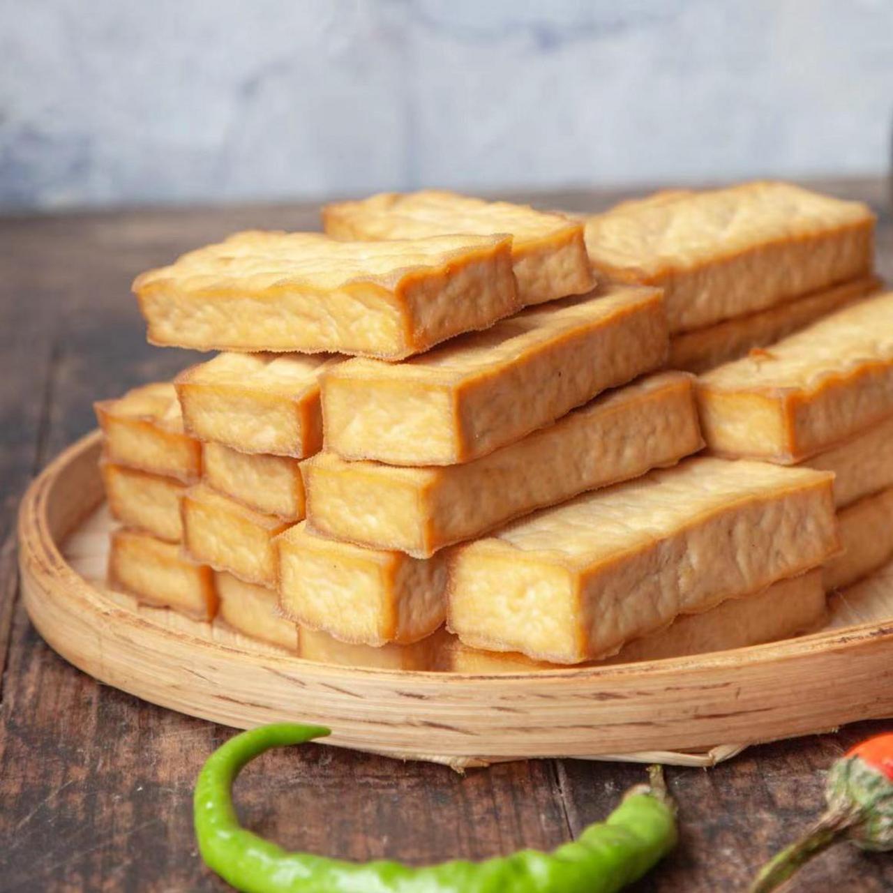 首先,湖南武冈豆腐干是采用当