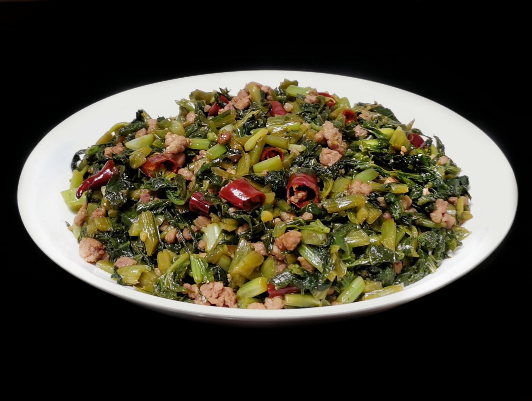 肉末炒雪里红 肉末炒雪里红: 1,腌好的雪里红用清水多洗几遍(去咸味)