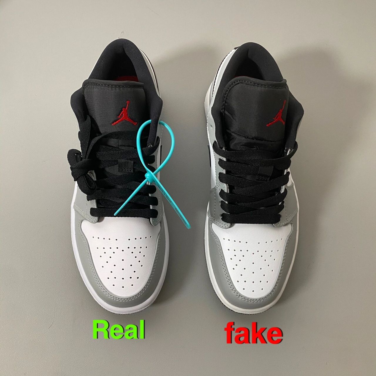 aj1 低帮 烟灰 小迪奥真假对比 16615鞋头:正品鞋头略低没有弧度