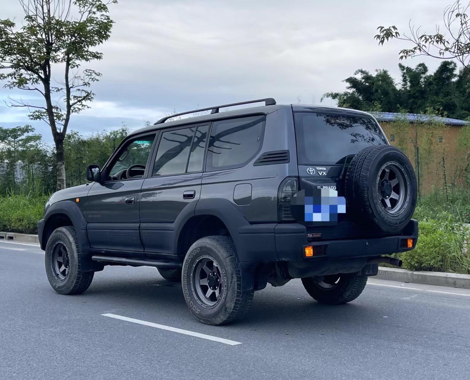 新到03年丰田霸道3400,v6大功率,lc95,改装大灯透镜,str绞牙减震器