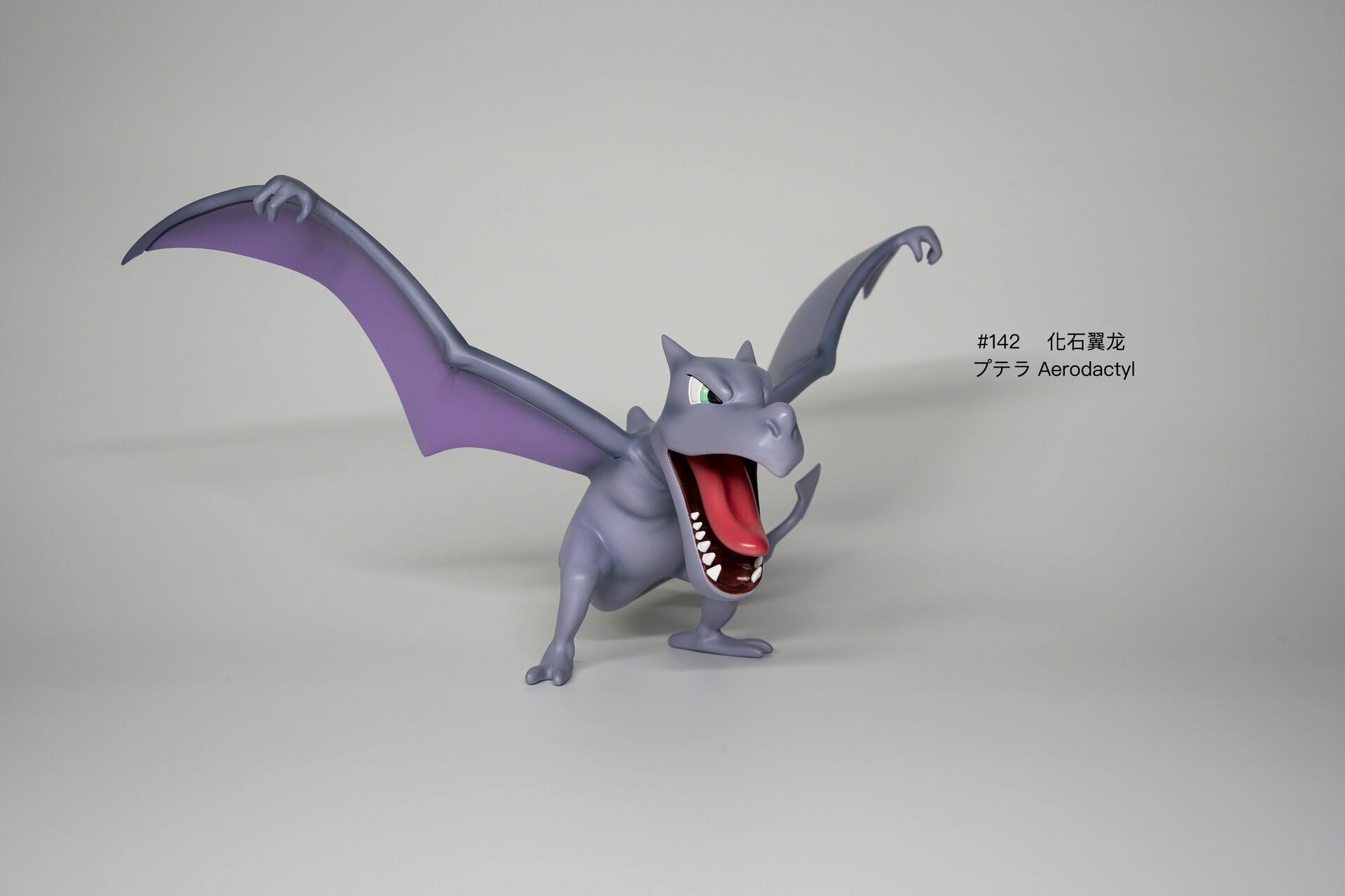 宝可梦图鉴 1:20 化石翼龙 化石翼龙,是通过研究从琥珀中提取出来的