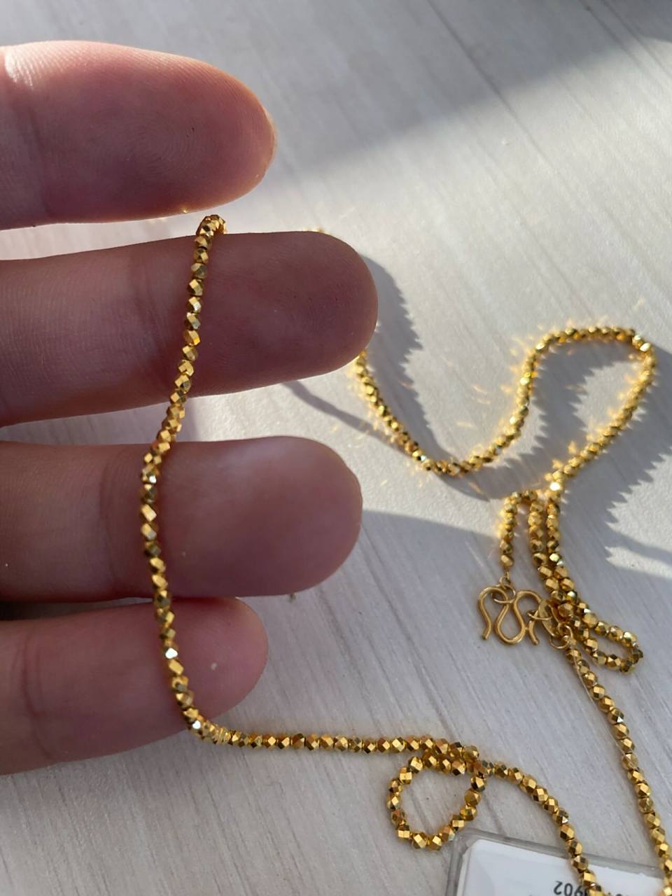 给母亲在中国黄金直播间买的,钢印是x足金999,x是什么意思,克重是7