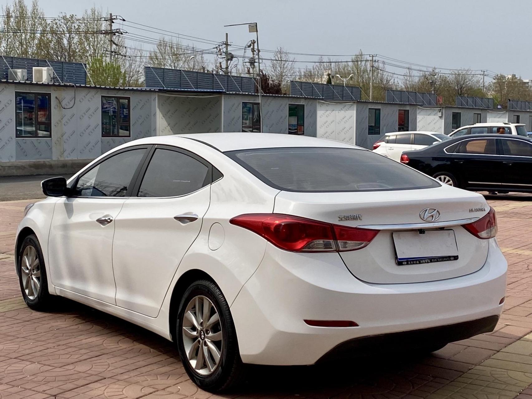 最新到家15年本地一手现代朗动,一键启动,多功能方向盘,天窗,1.