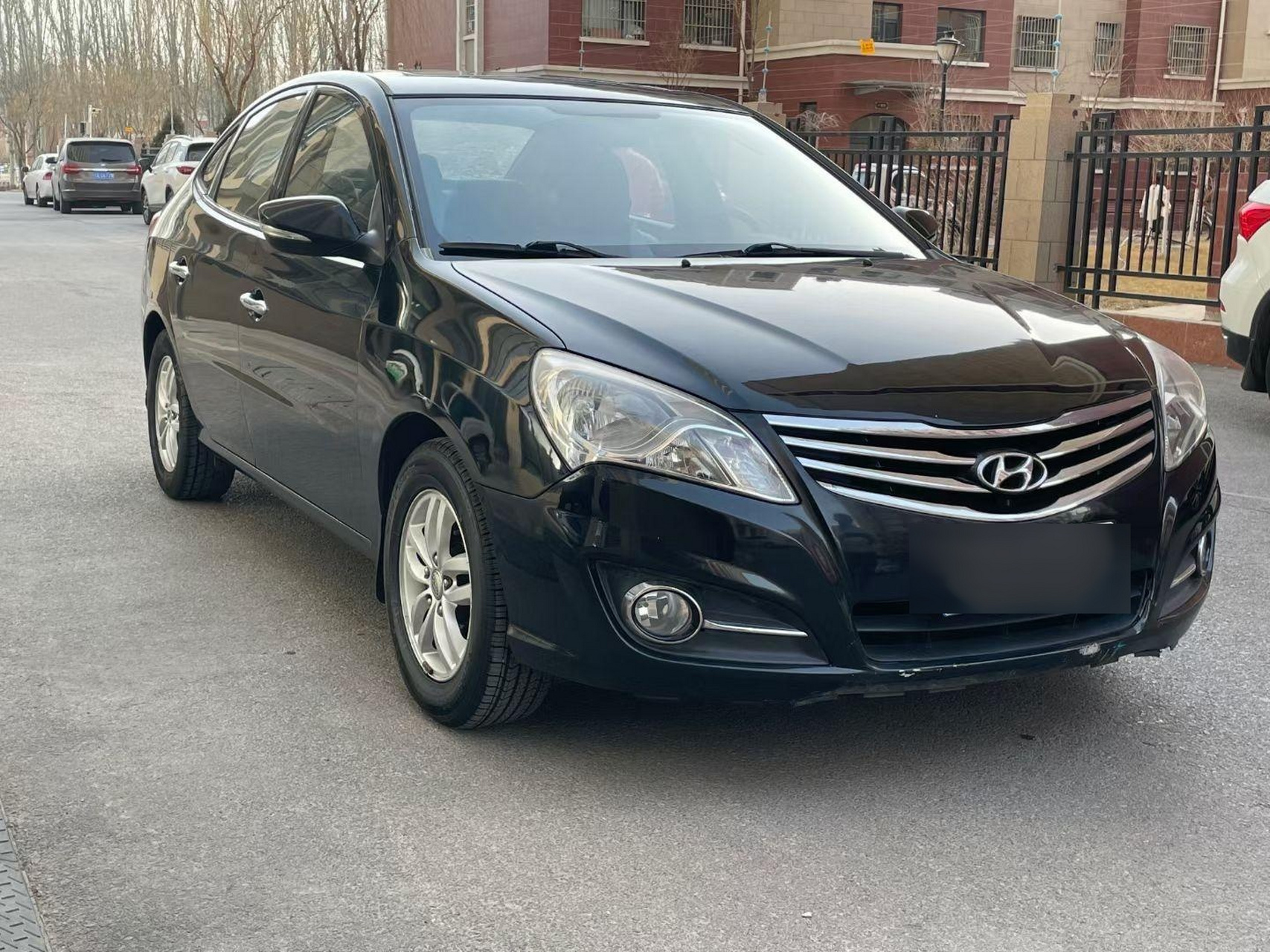 13年现代悦动手动高配