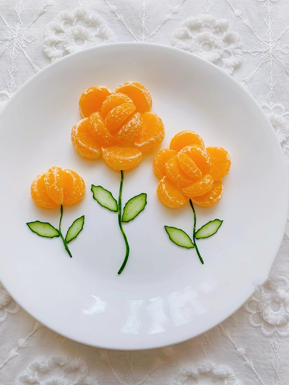橘子花朵水果拼盘～92 食材:橘子,黄瓜