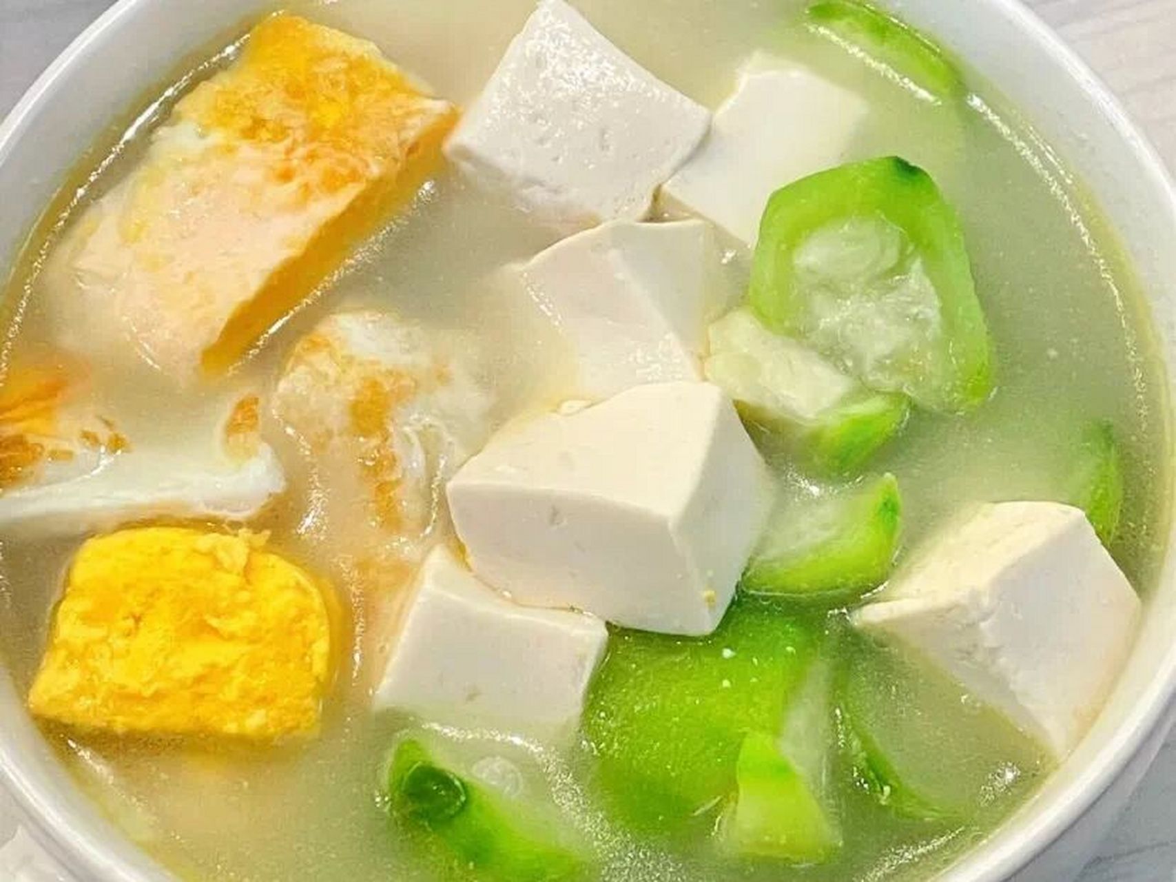 一日一菜(丝瓜豆腐) 丝瓜豆腐   【原料】 丝瓜2节,嫩豆腐150克,菜油