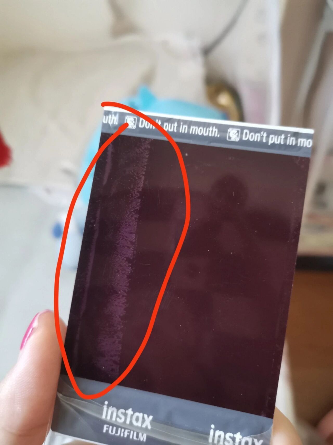 拍立得相纸背面为什么会这样?