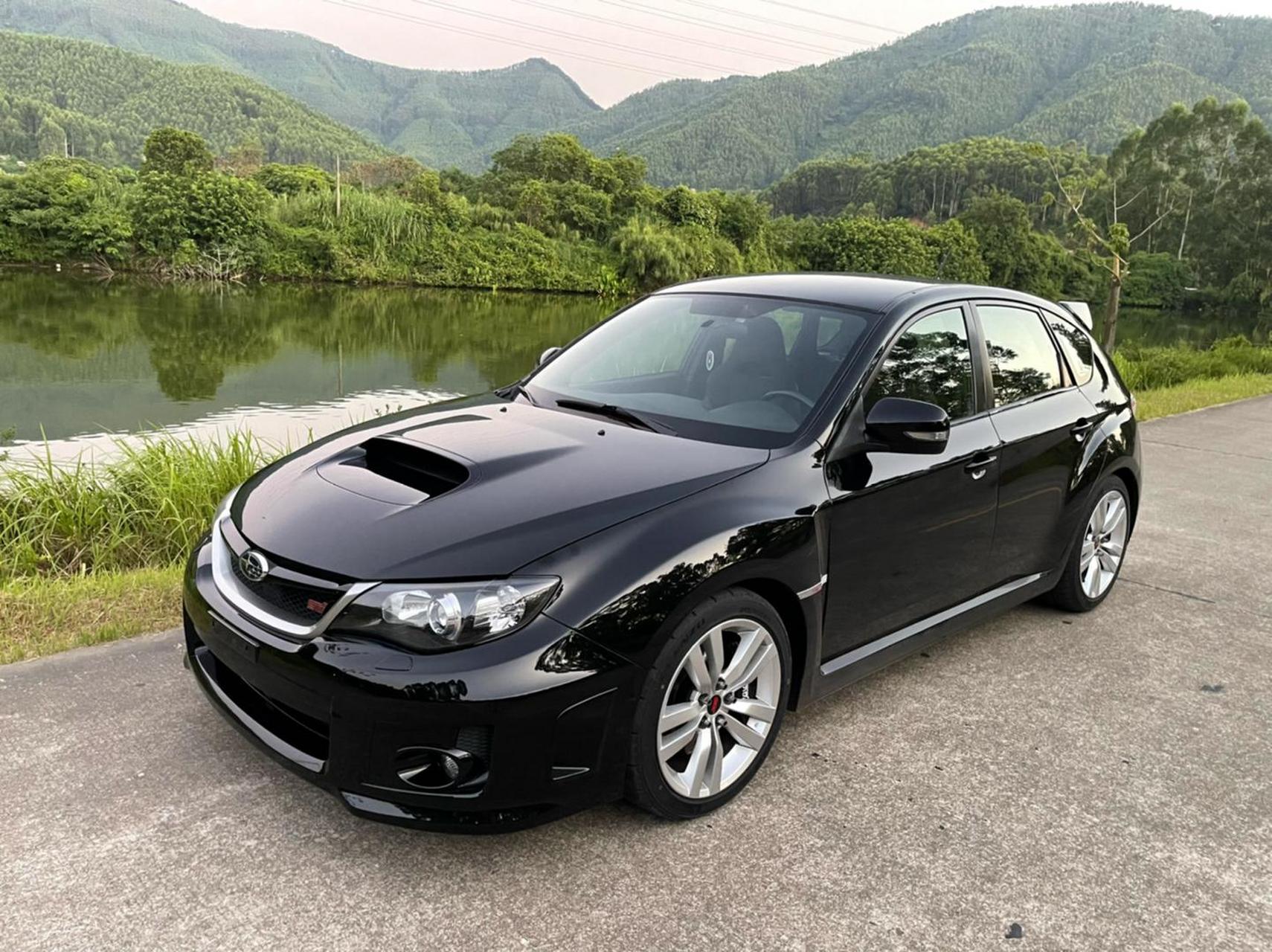 2009年精品斯巴鲁十代翼豹sti,ej257红头发动机,最大功率304匹马力!