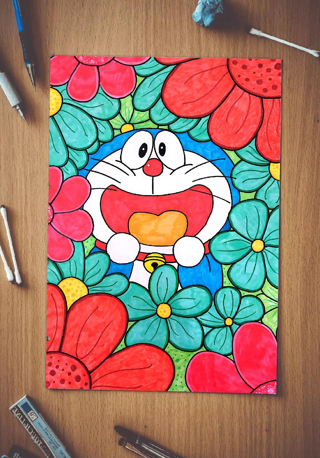 纸,勾线笔,水彩笔或马克笔 课时:两小时 步骤: 先用铅笔画出哆啦a梦