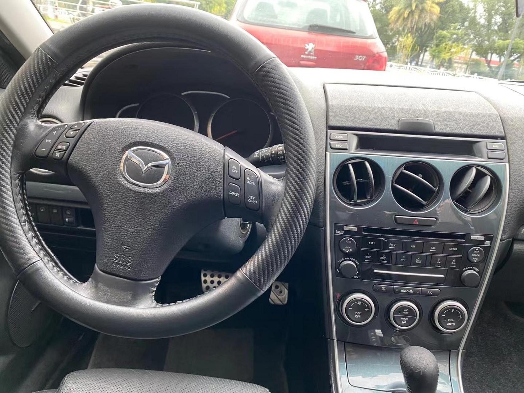 3.07年马六轿跑2.