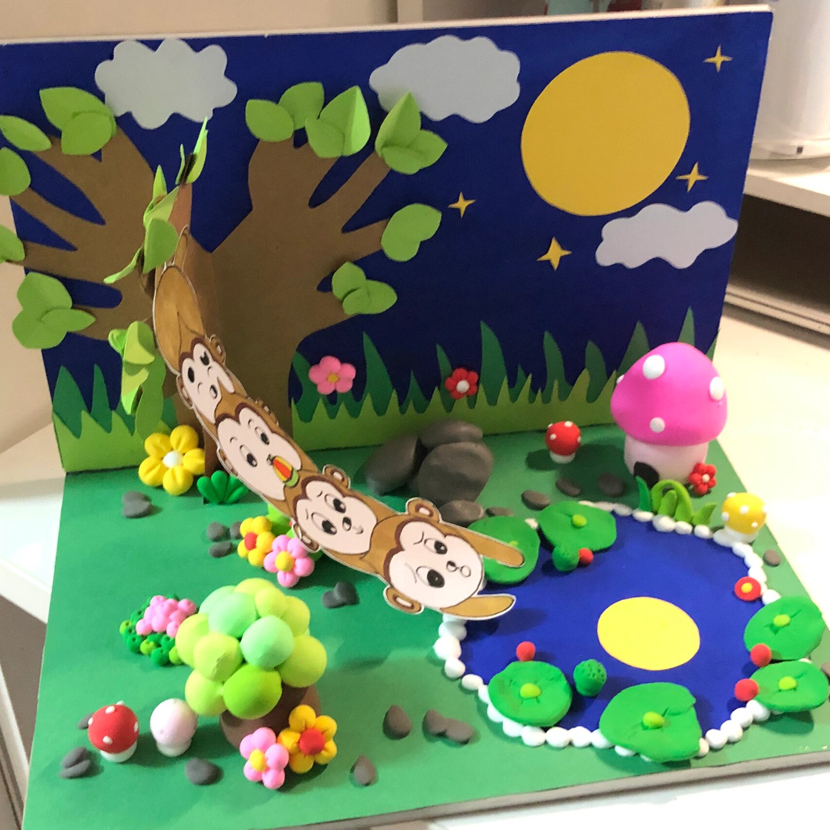 手工作品《猴子捞月》粘土