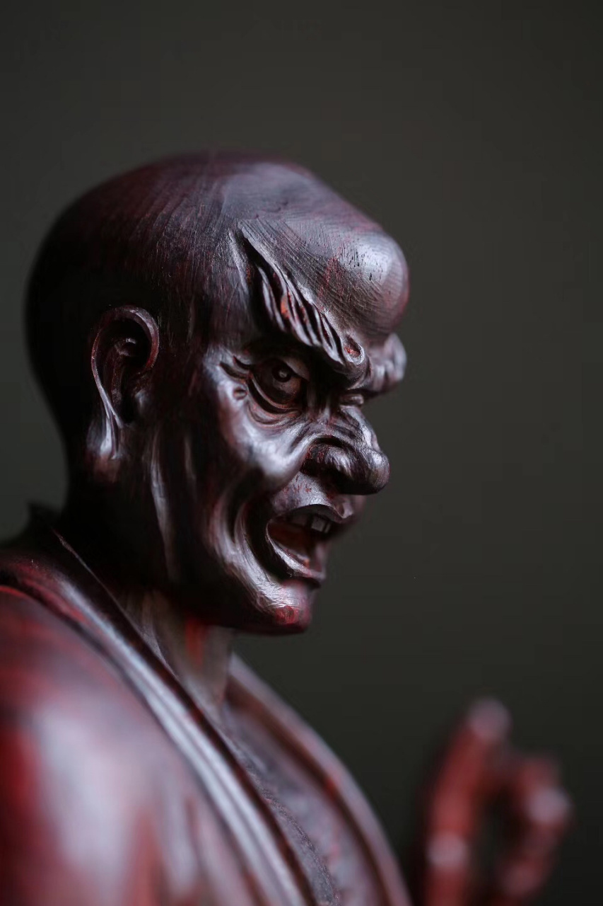 紫檀【降龙罗汉】  罗汉浓眉怒目, 右手擒龙头,左手持宝珠, 孔武有力