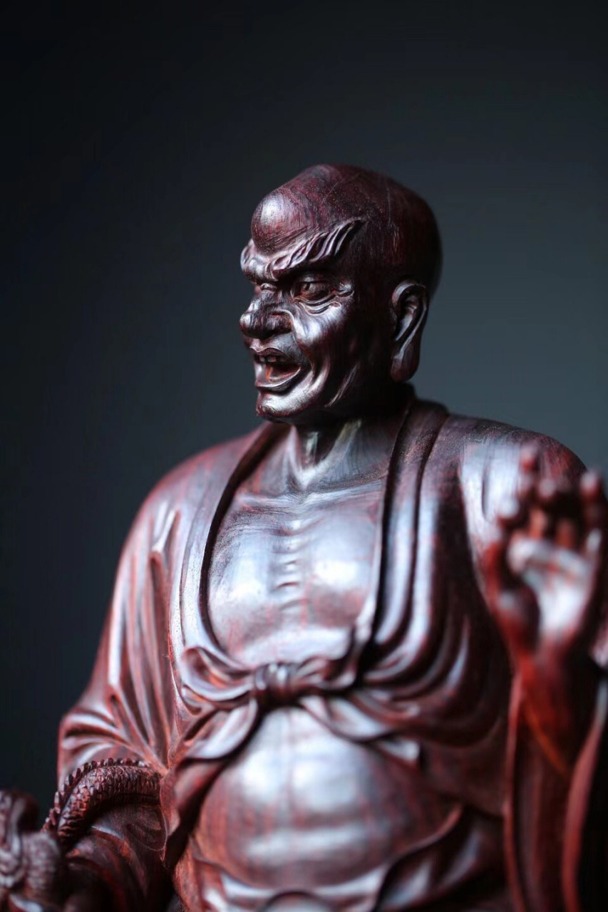 紫檀【降龙罗汉】  罗汉浓眉怒目, 右手擒龙头,左手持宝珠, 孔武有力
