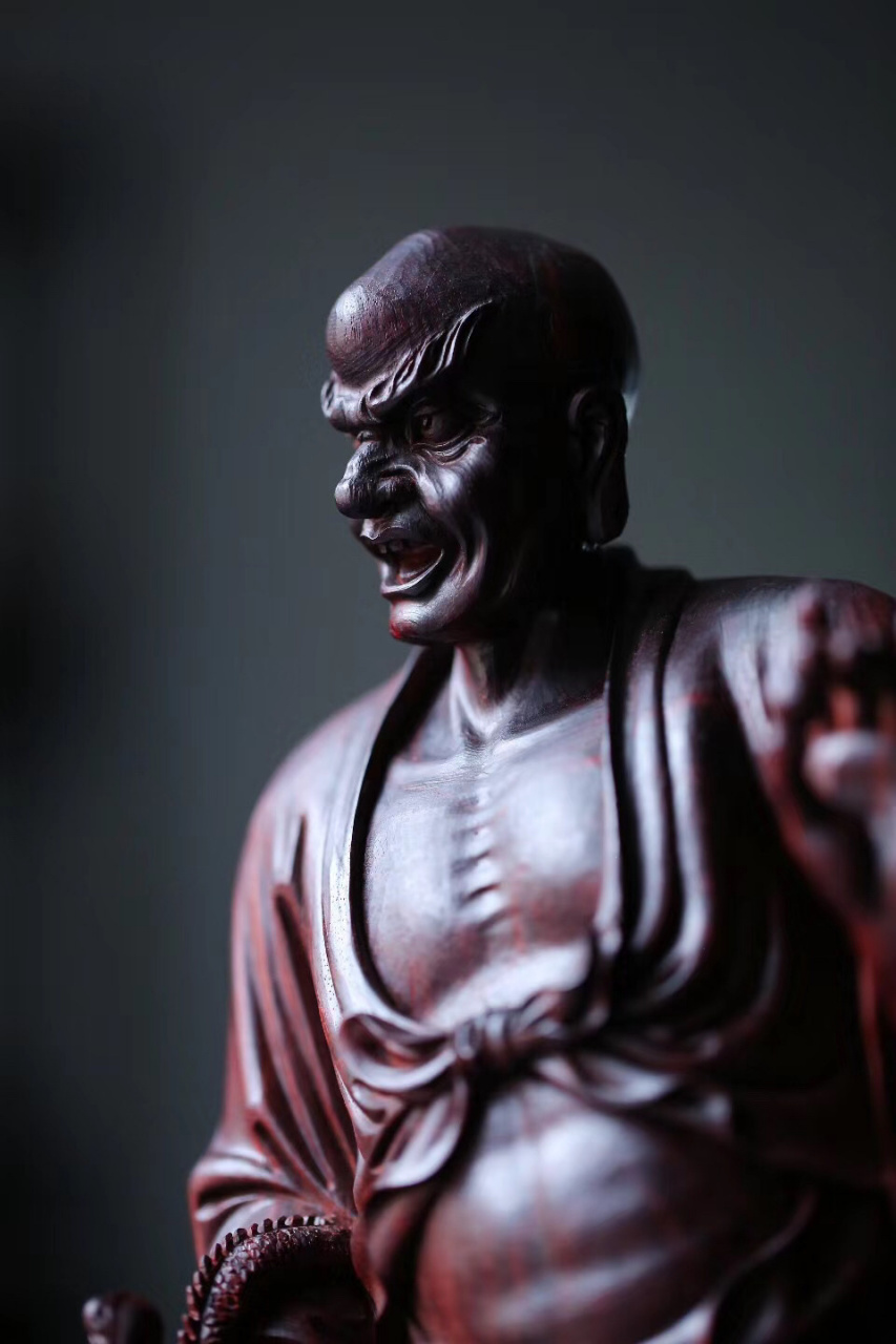 紫檀【降龙罗汉】  罗汉浓眉怒目, 右手擒龙头,左手持宝珠, 孔武有力