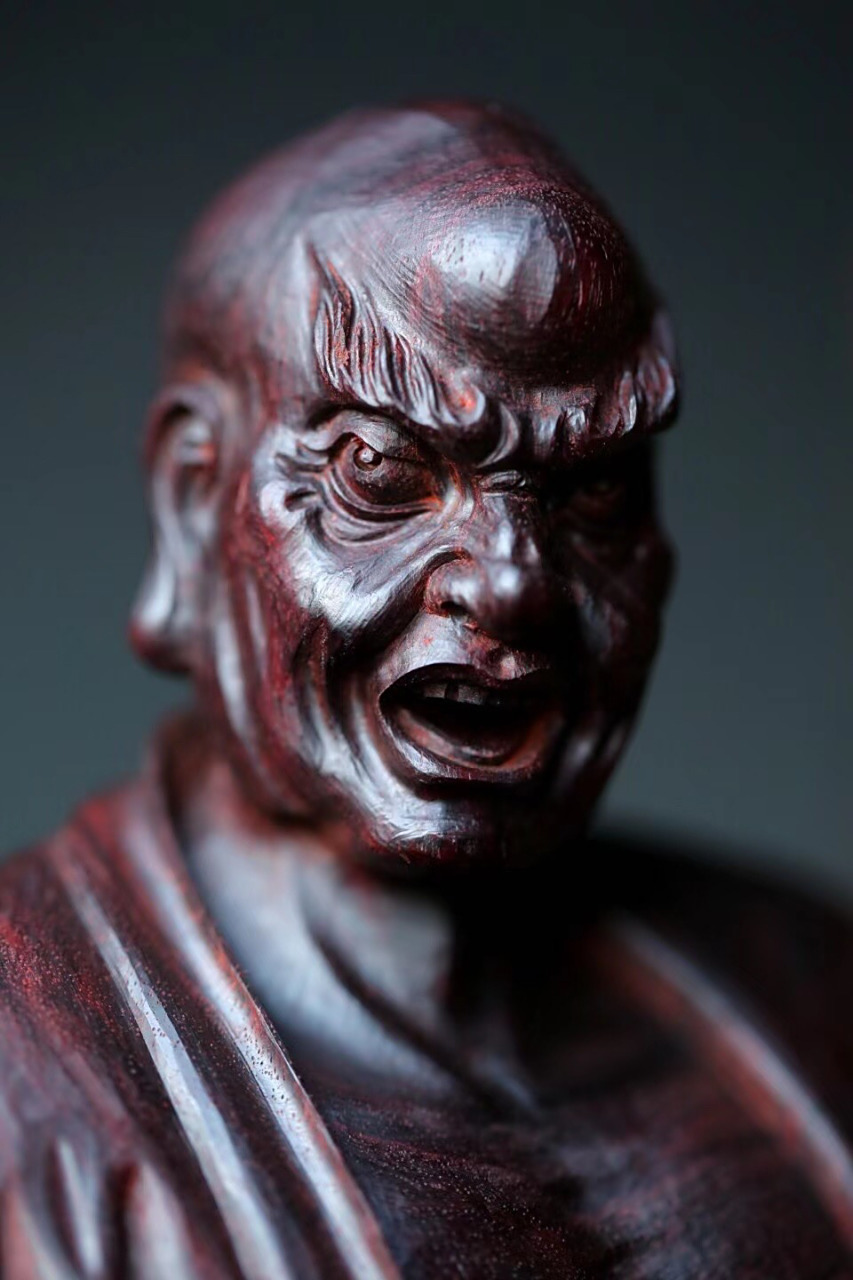 紫檀【降龙罗汉】  罗汉浓眉怒目, 右手擒龙头,左手持宝珠, 孔武有力