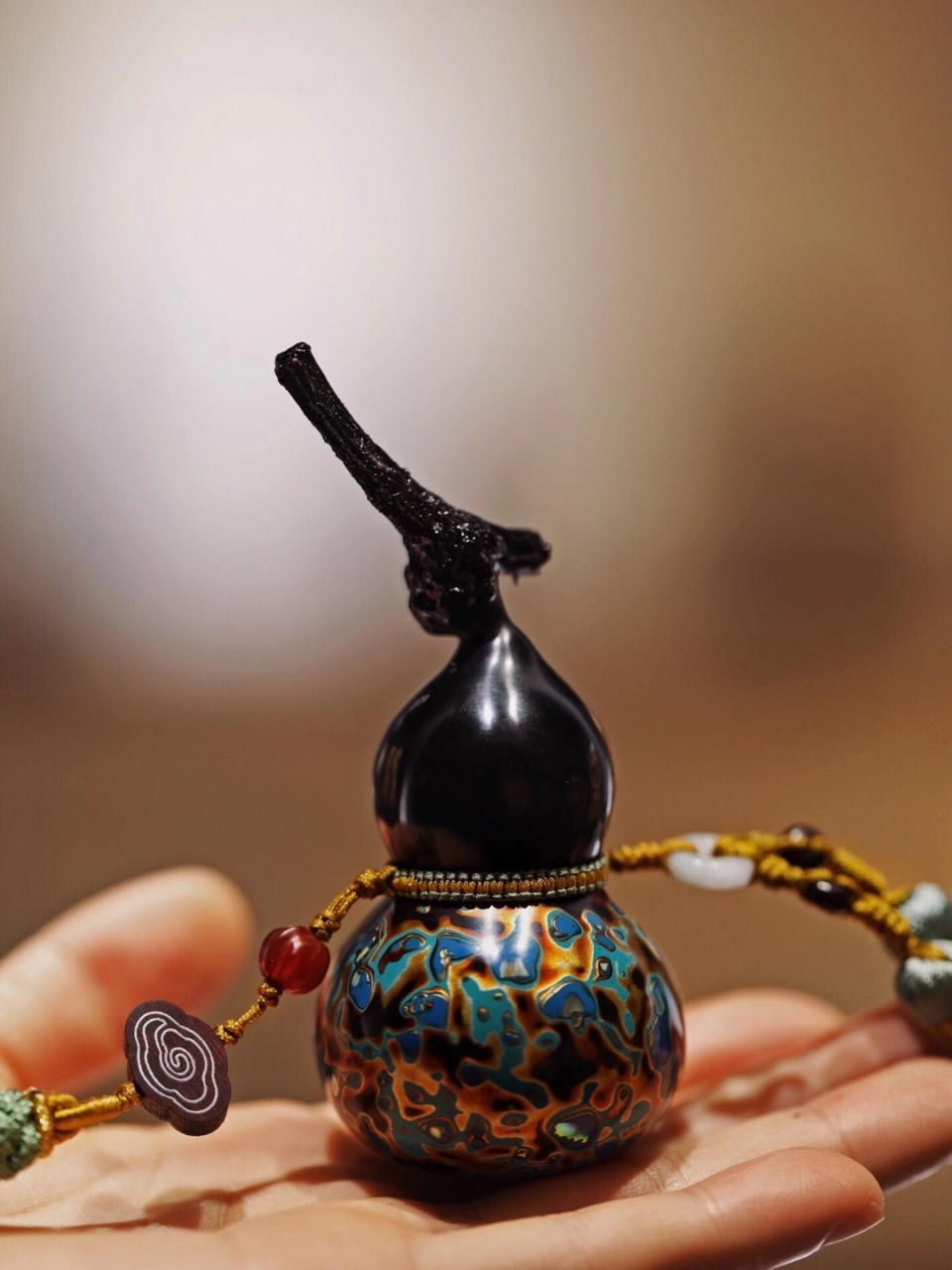 『大漆·福禄』挂件  吉祥的葫芦与光芒内蕴的大漆相互映衬,将东方