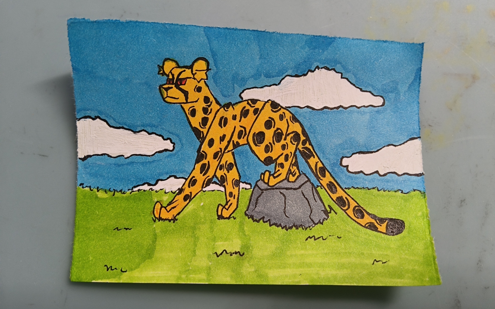 我画了一只豹子在岩石上,背景是蓝天白云,不知道画成这样有没有救,有