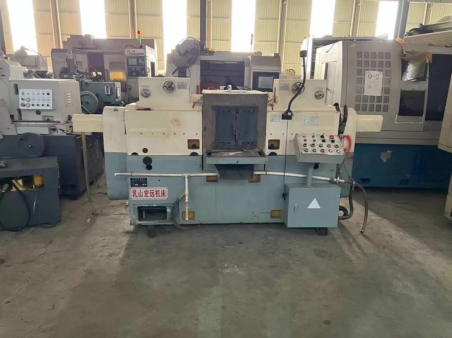 乳山 7650 双端面磨床一台,9 成新安装少用要的联系