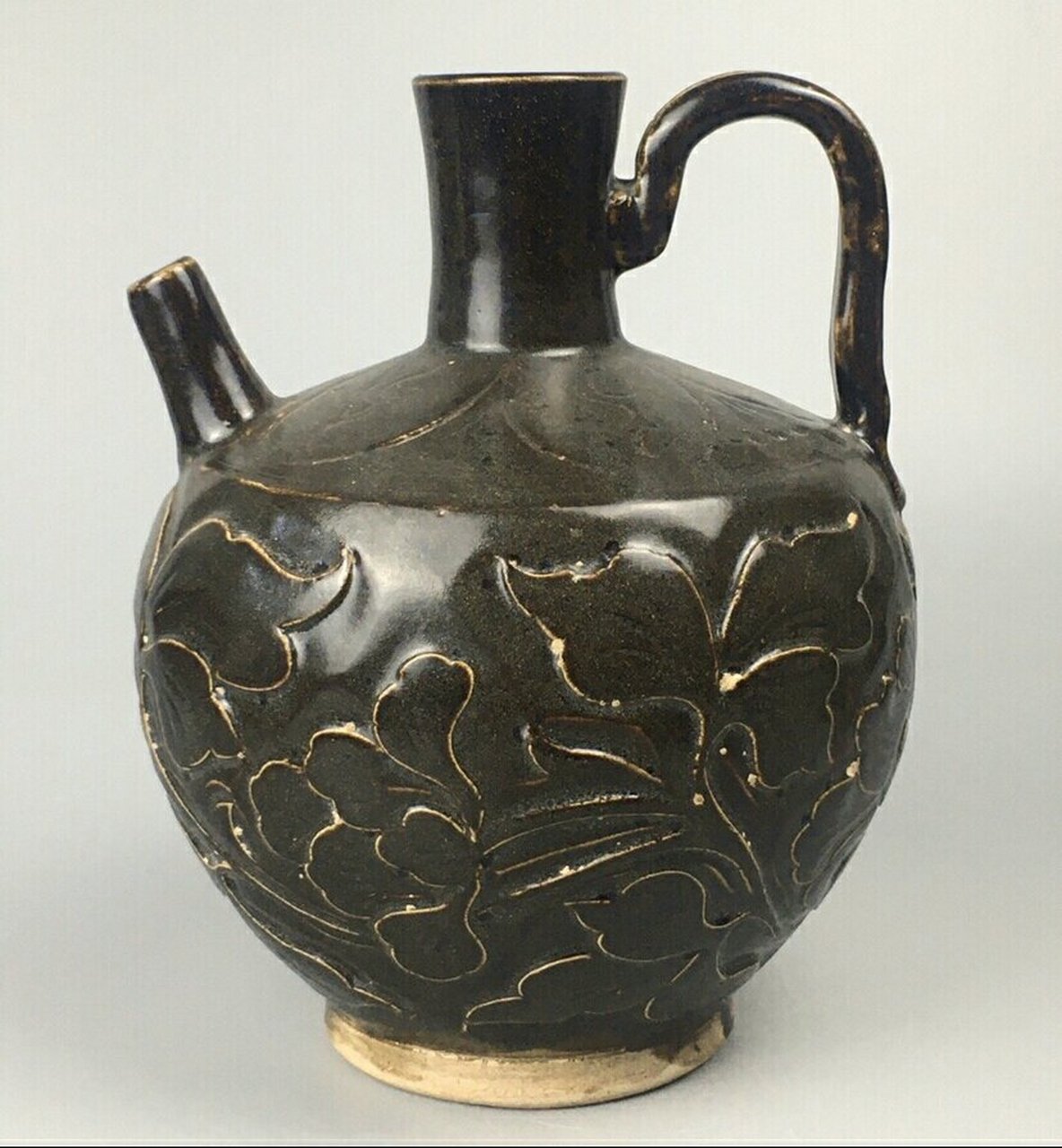 瓷器鉴赏实录#瓷器#  &藏友咨询: 黑釉壶,高20厘米,请老师看看价值