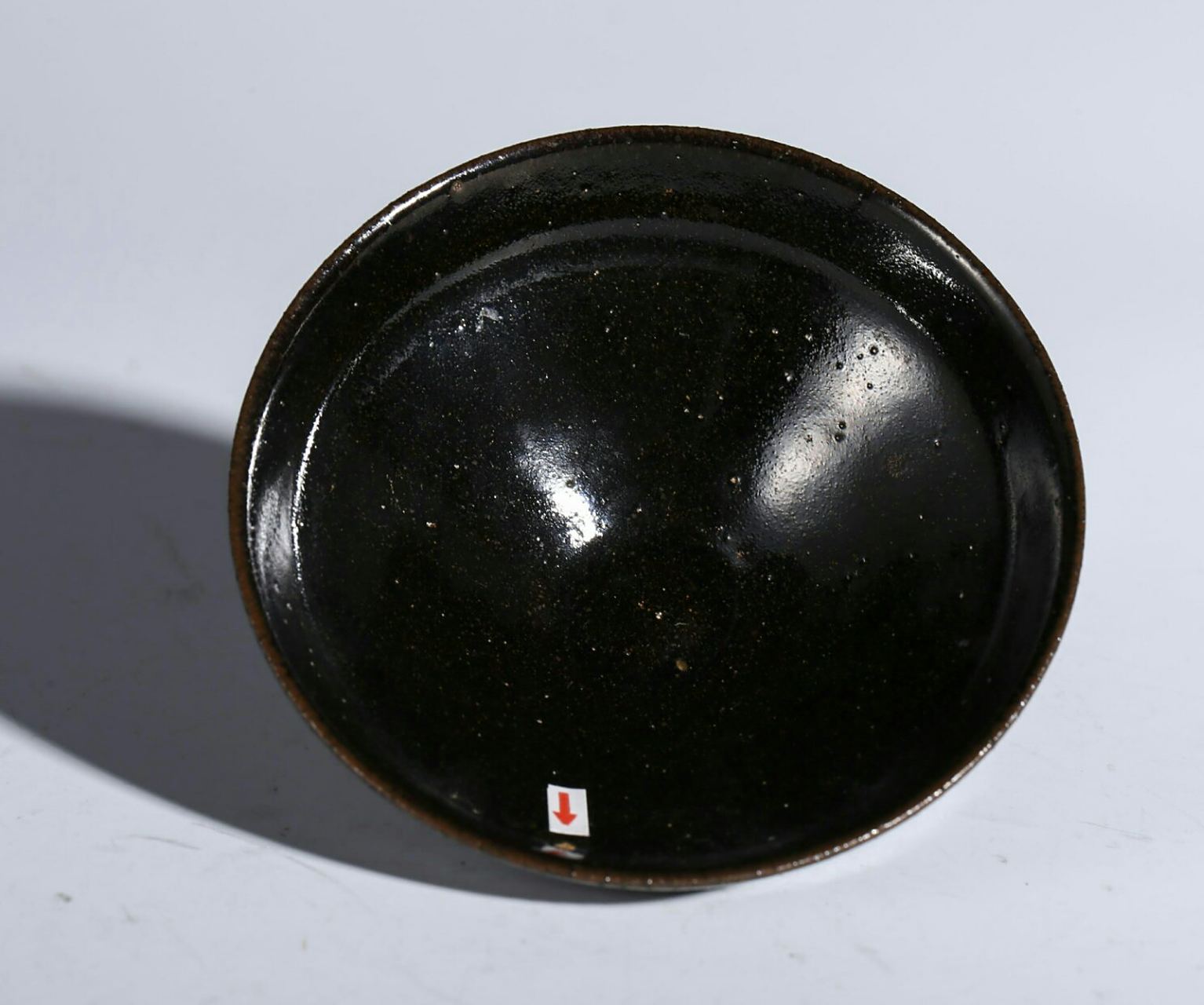 瓷器鉴赏#  此件元耀州窑黑釉盏, 口径10.6cm,高4.4cm,底径3.