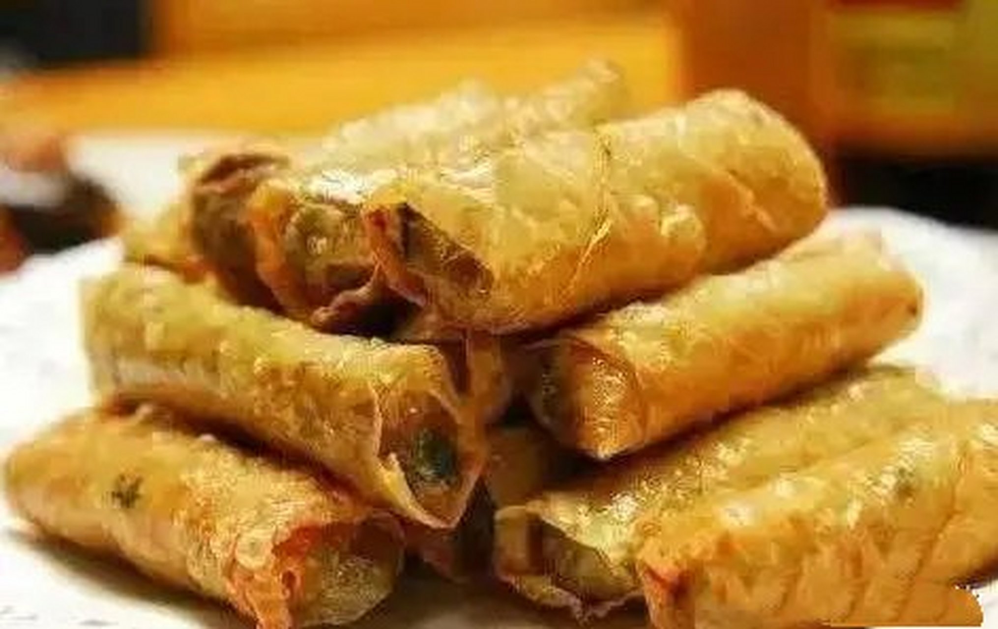 豆油藕卷:俗叫豆油卷,是楚乡湖北孝感民间传统风味素菜名馔