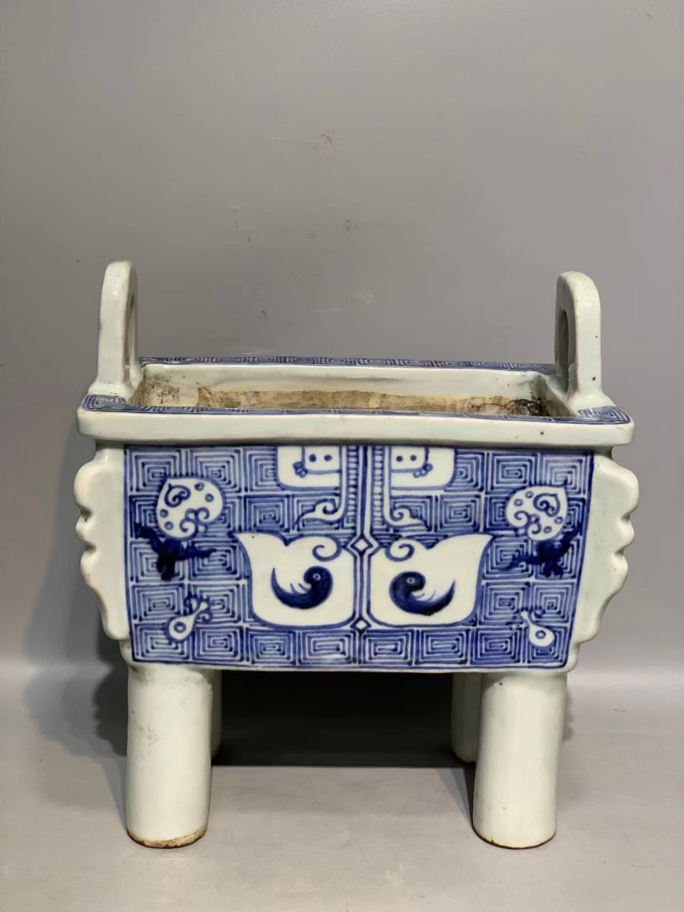 清早期青花脸谱纹四方双耳鼎炉