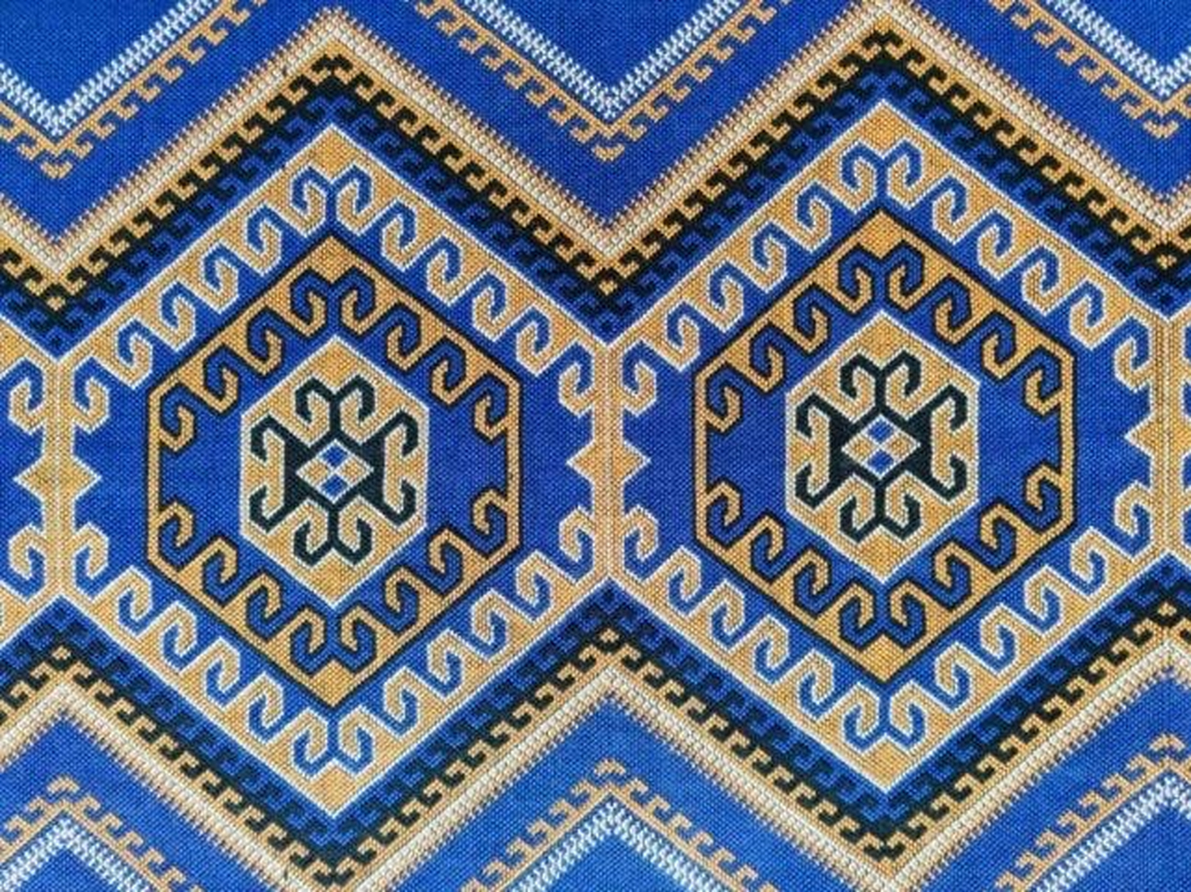 西兰卡普,土家语,汉语意为"土花铺盖"或"土家铺盖"