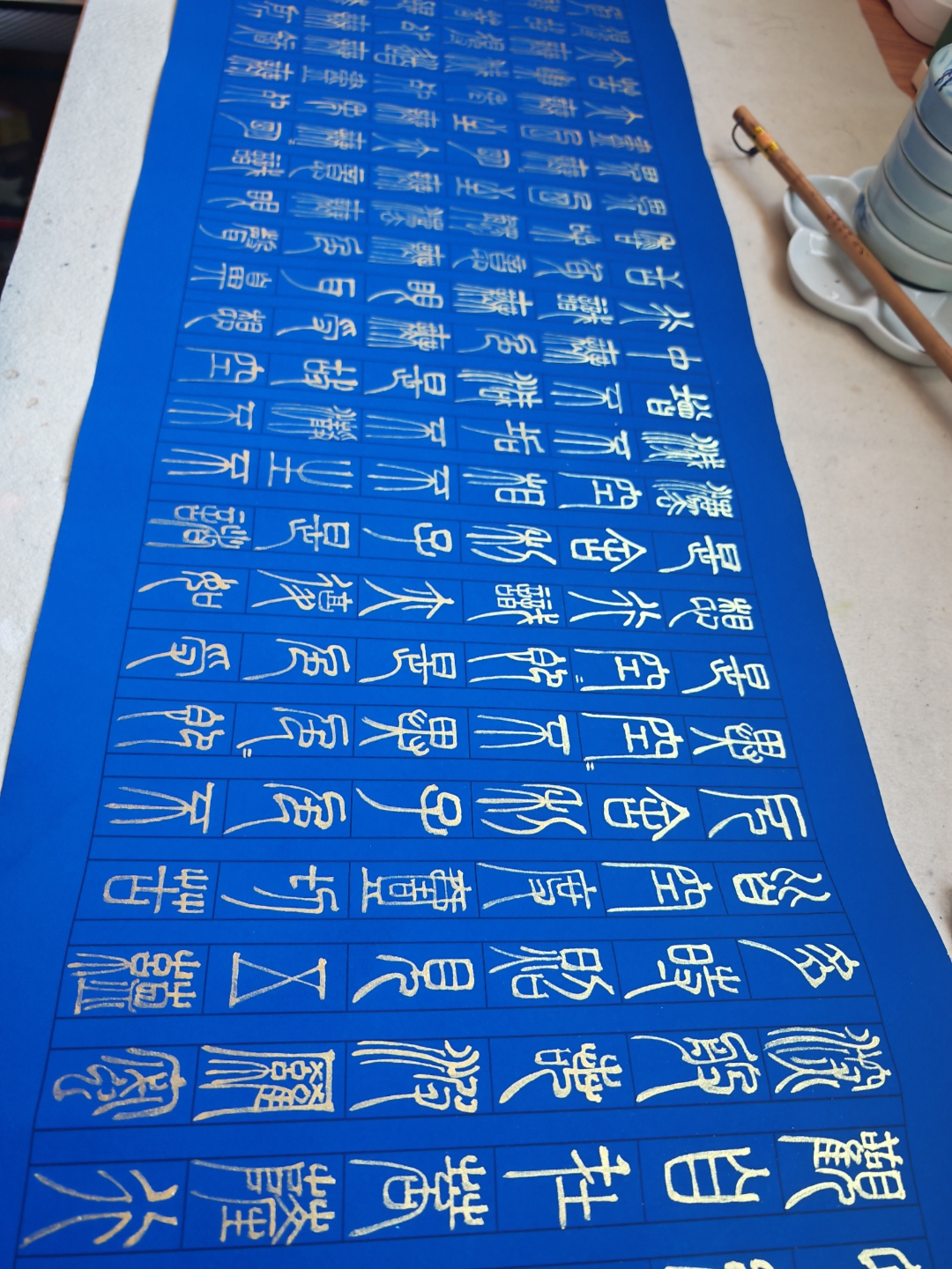 蝉噪高林声愈烈,汗濡素纸迹犹深