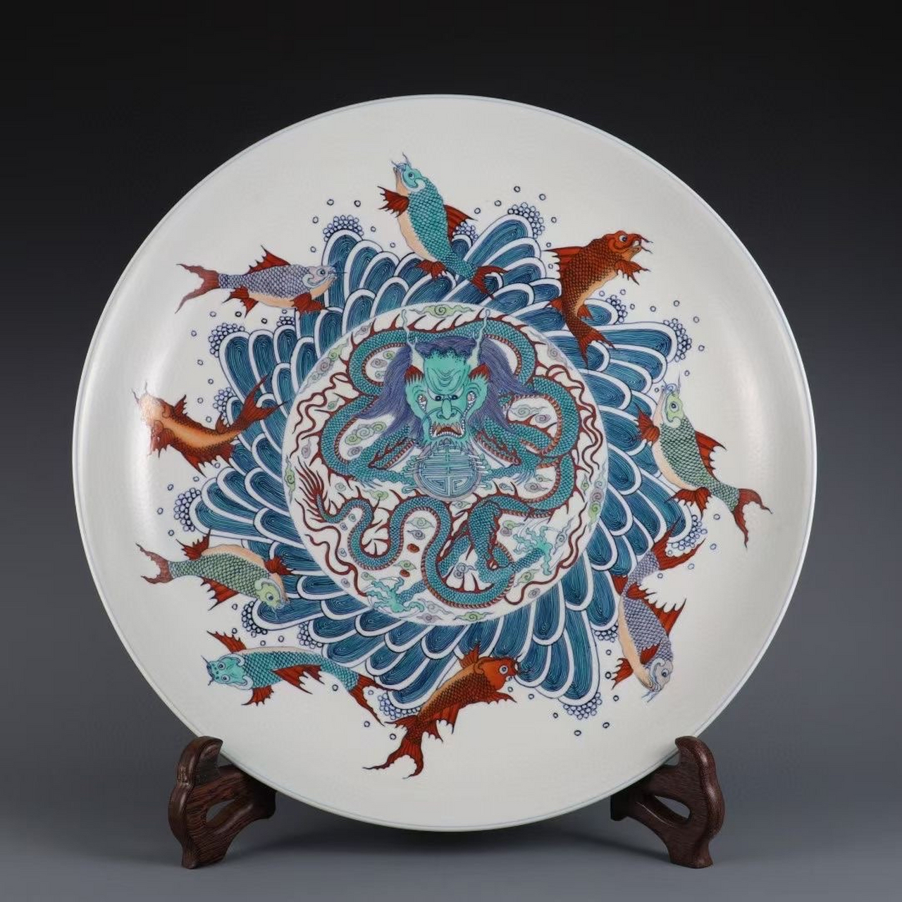 清,斗彩鱼化龙盘