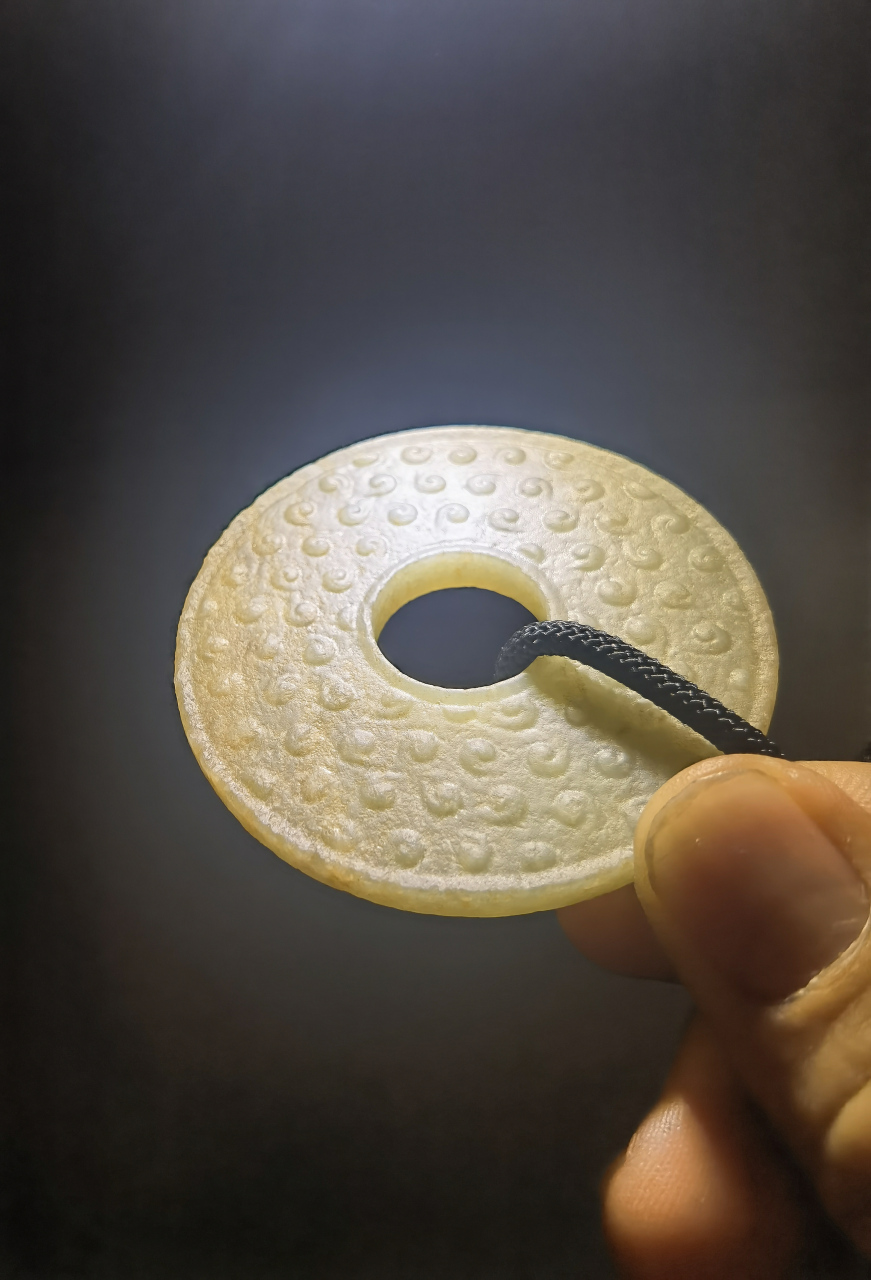 战国谷纹和田玉玉壁    [来][来][来]