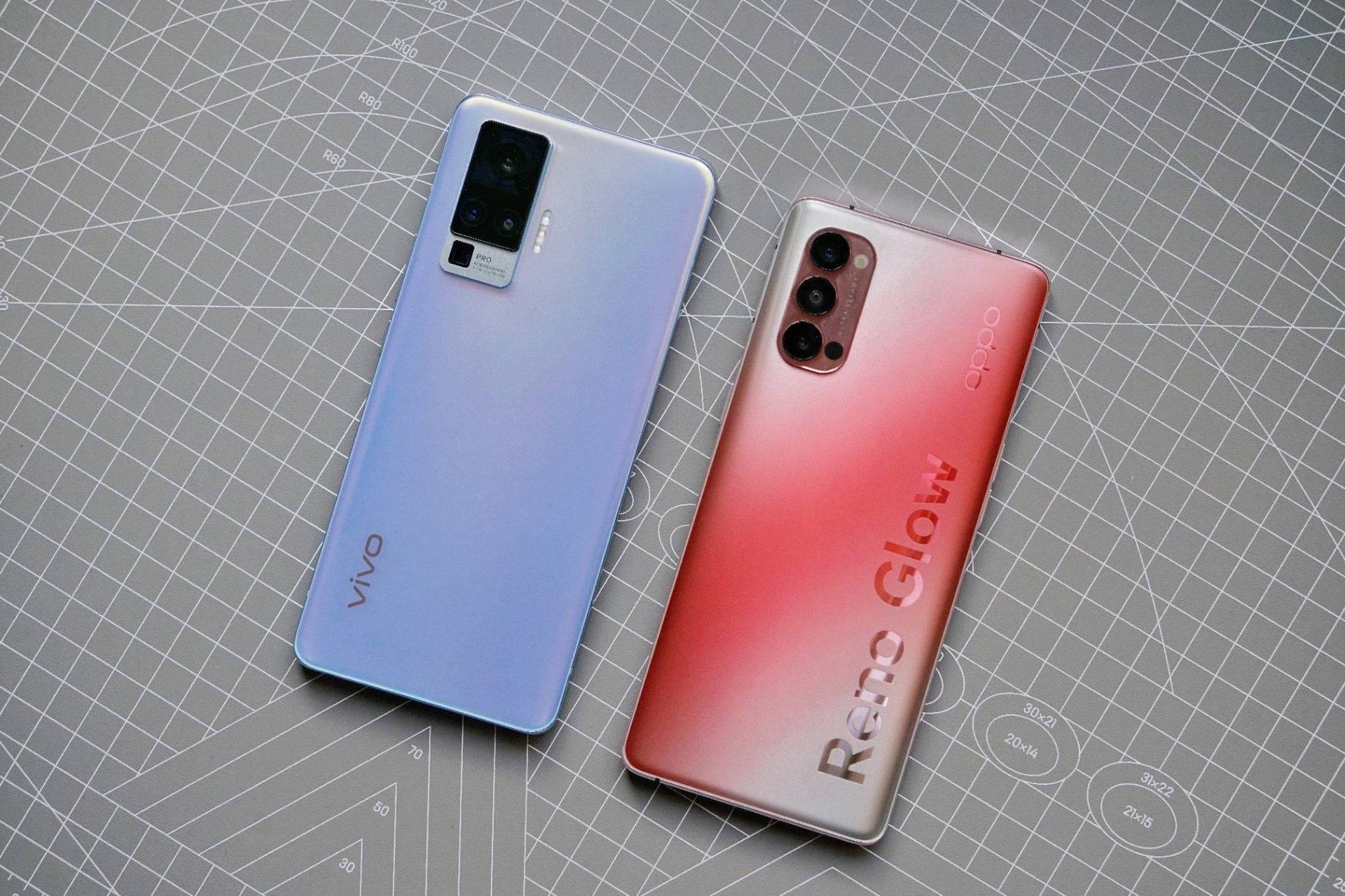 oppo reno4 pro:65w闪充,晶钻工艺 vivo x50 pro:微云台,潜望长焦