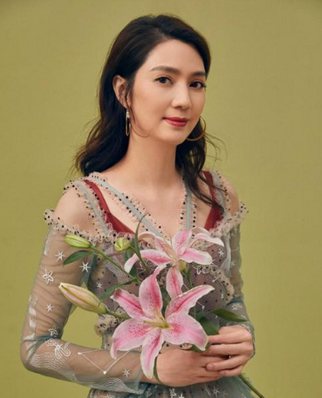 2000年,洪欣和莫少聪分手后不久,发现自己怀孕了.