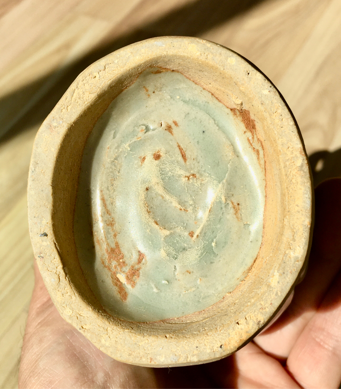 明代龙泉窑梅子青釉双耳福寿纹花口瓶