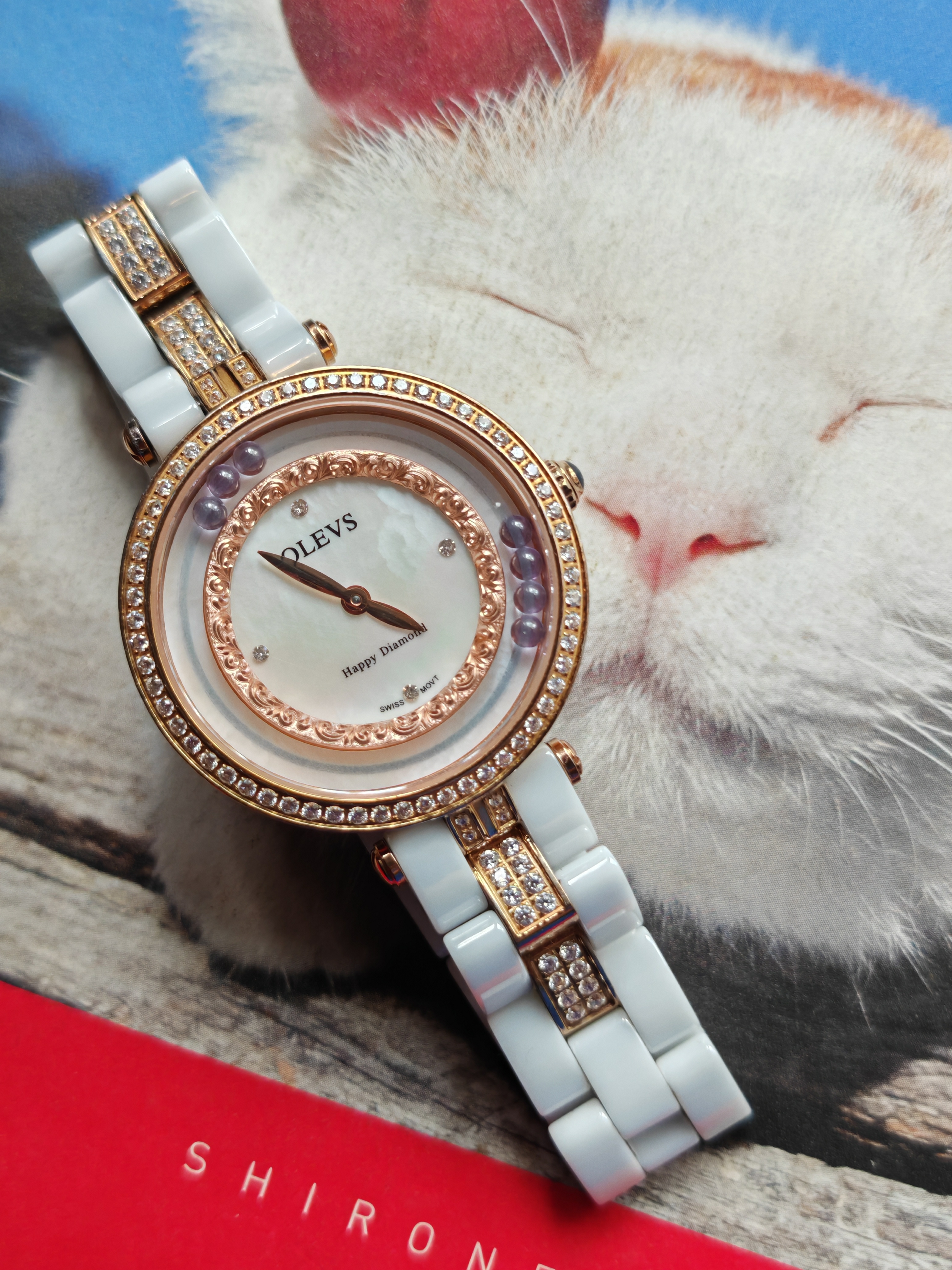 国产olevs女款石英表,造型时尚,陶瓷表带,瑞士石英机芯,走时正常稳定