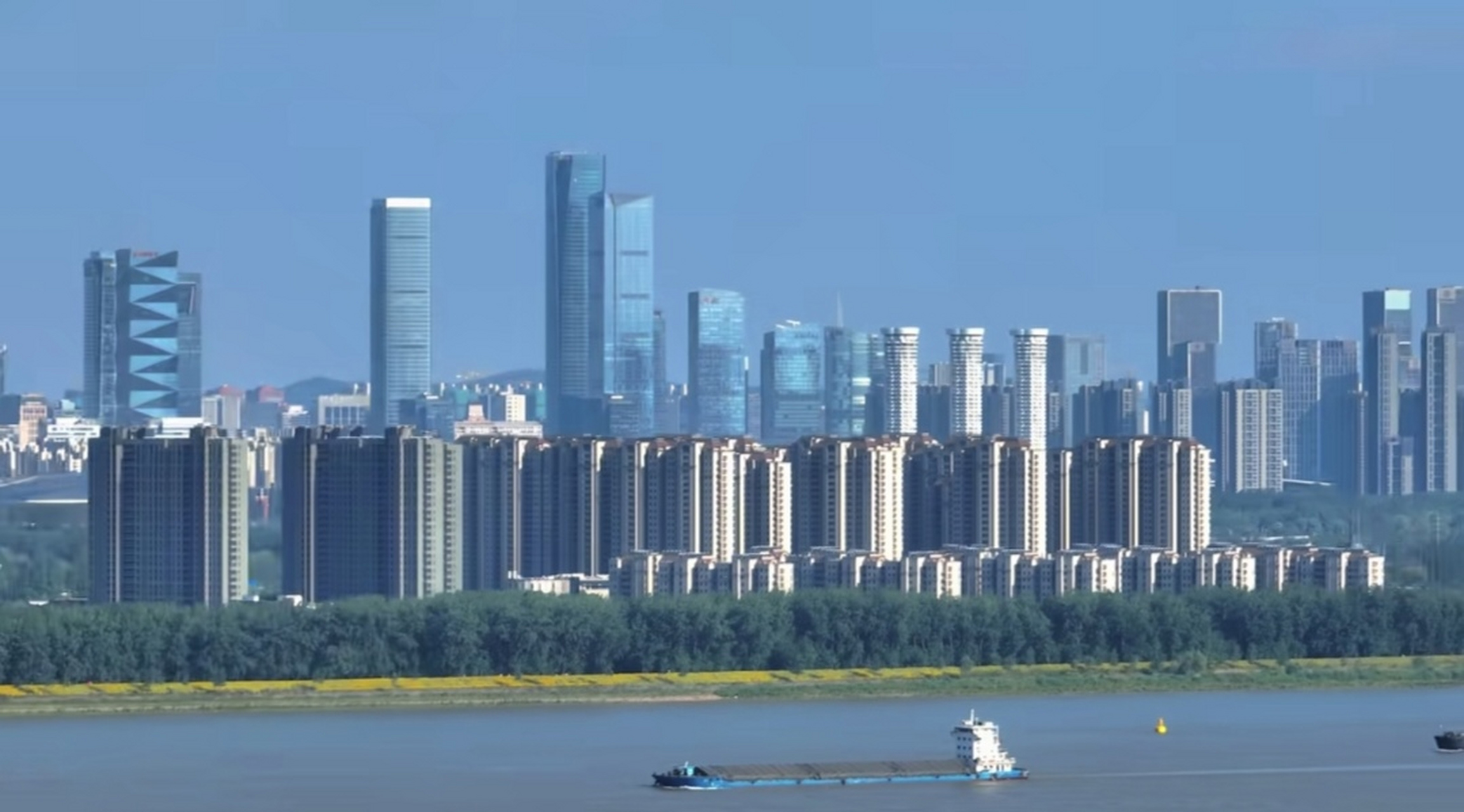 如果南京的江北新区,最终呈现效果能达到河西新城这样,那就算成功了.