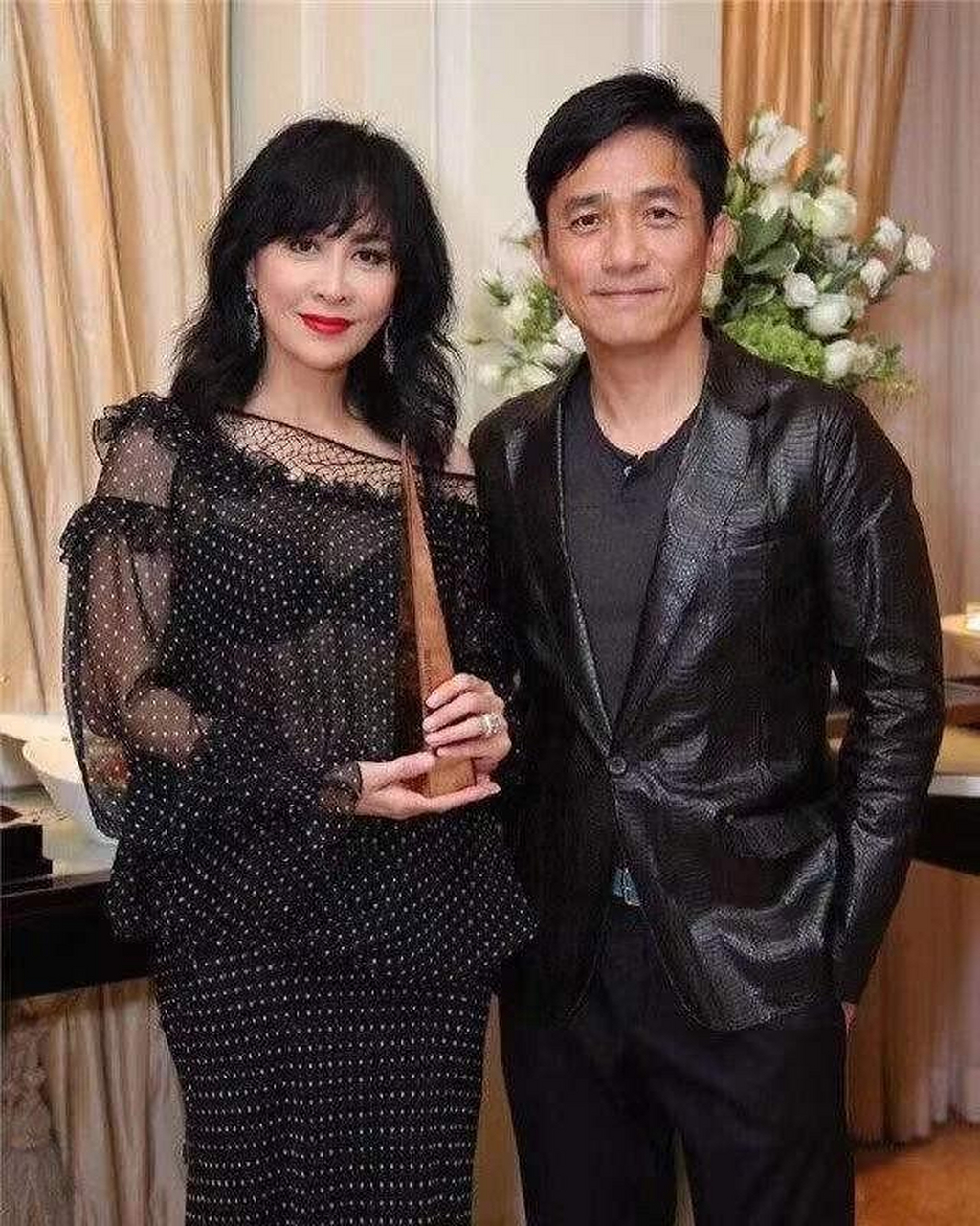 罗嘉玲和梁朝伟.