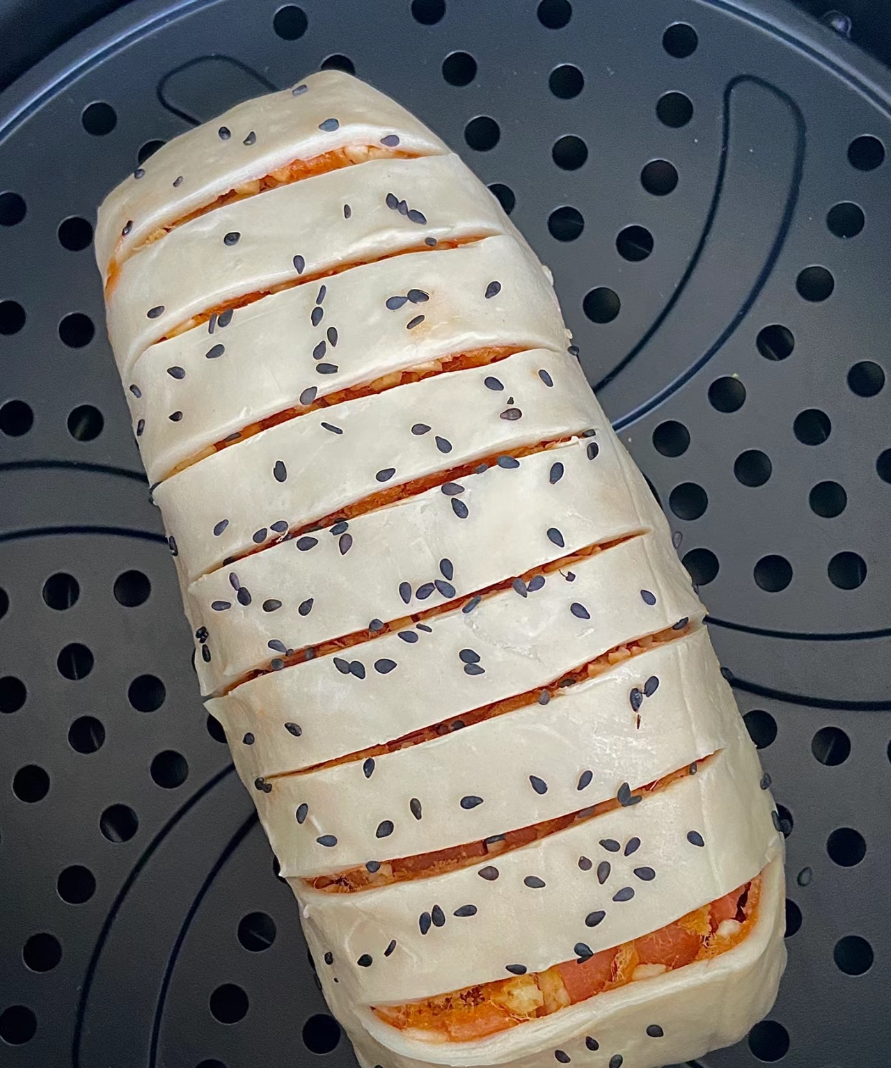 食材: 手抓饼 火腿肠 芝士碎 肉松 番茄酱