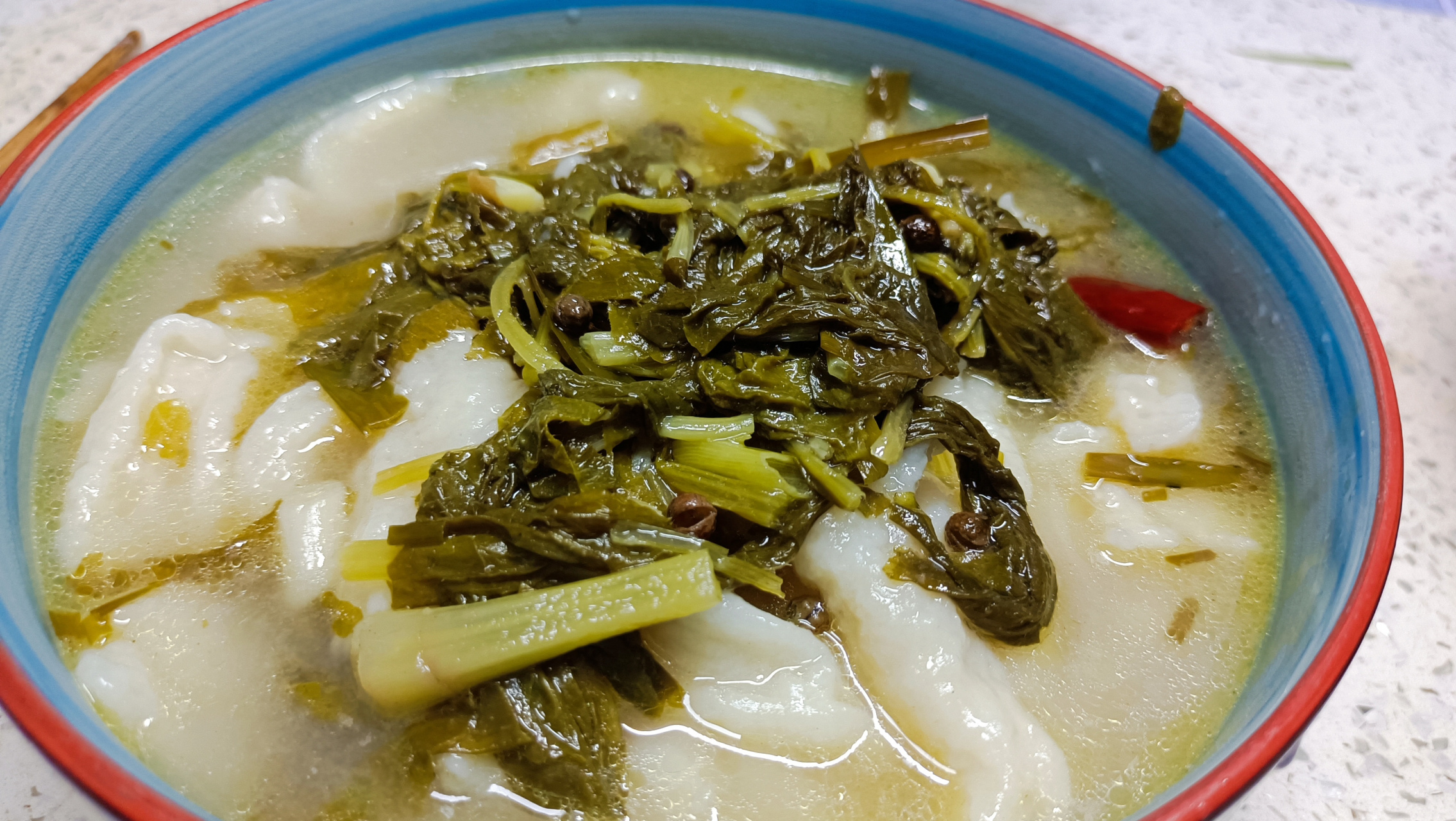 四川广元人爱吃的酸菜面鱼子!