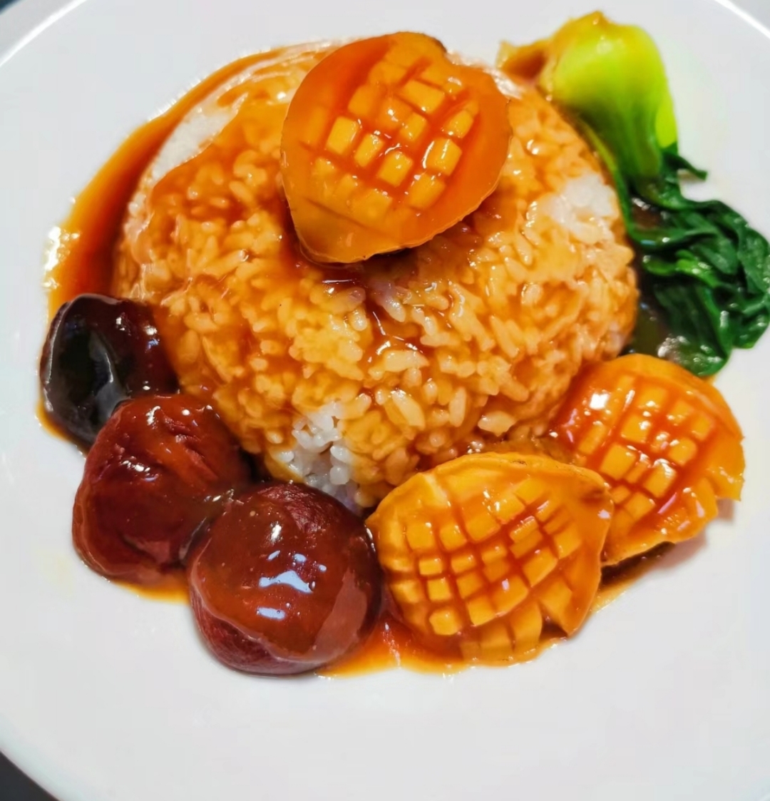鲍汁捞饭是一道经典美食.