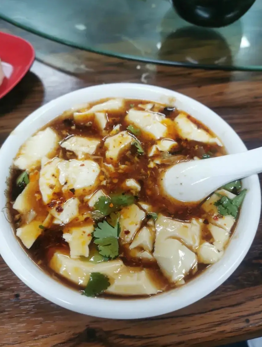 山东豆腐脑最好吃的是聊城高唐老豆腐,在聊城上学的时候,豆腐脑来一勺