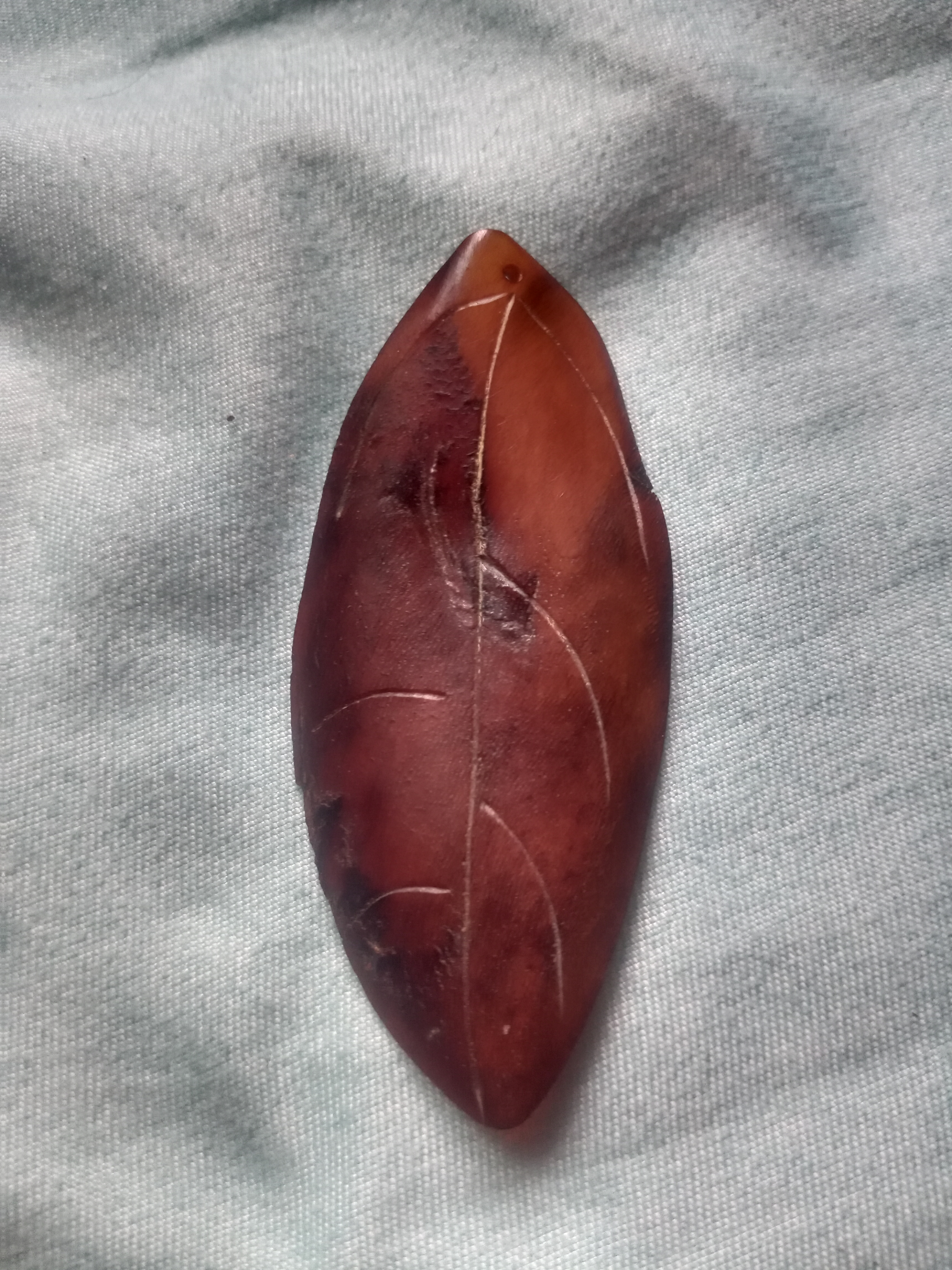 驴蹄子制品挂件上的竹丝纹和鱼子纹.