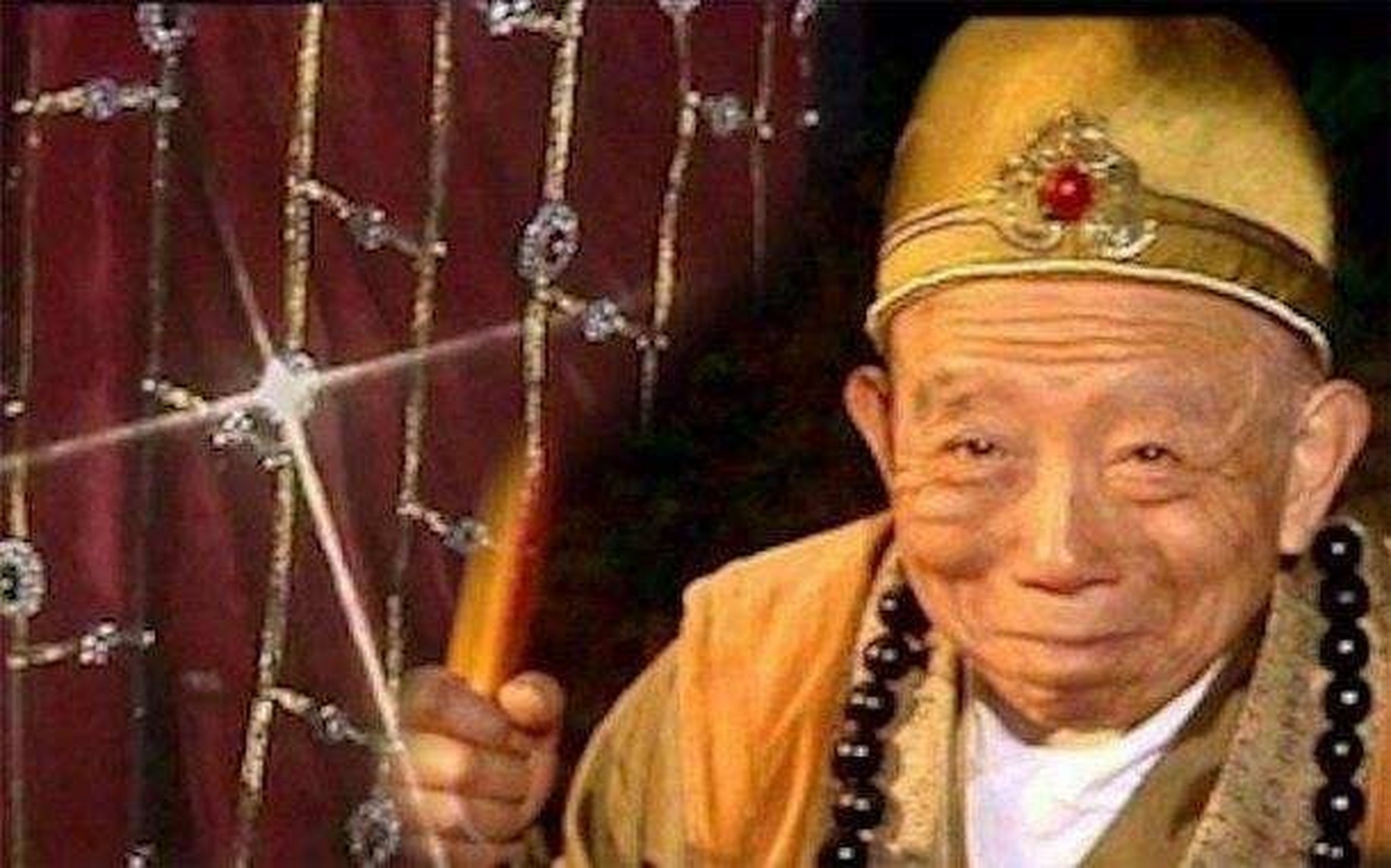 黑风山的黑熊精为何要破坏锦襕袈裟?