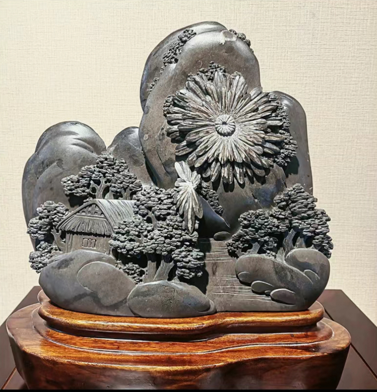 今天我要带你们一起探索一个湖南的非遗宝藏——菊花石雕!