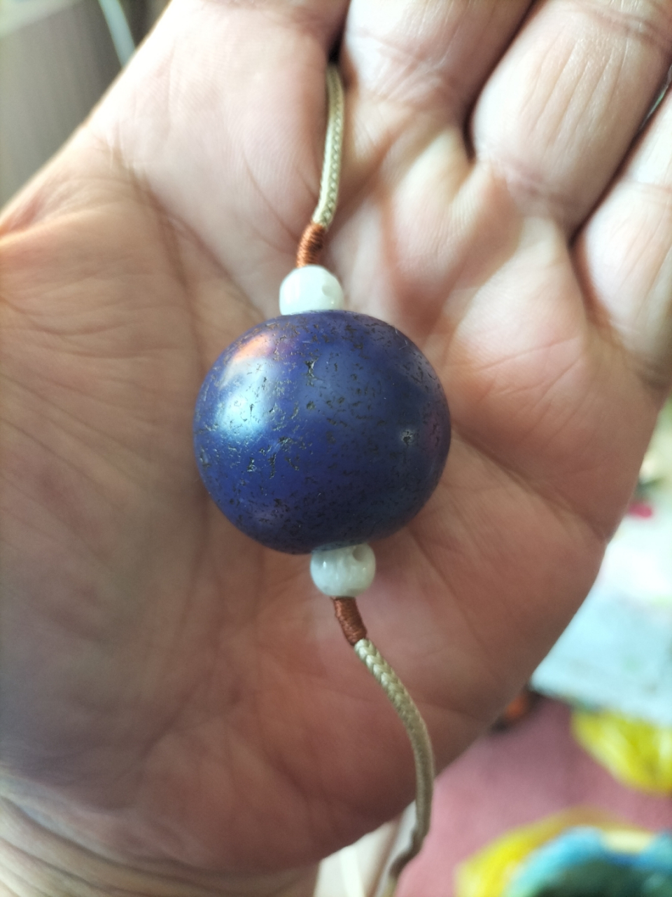 顶戴花翎的玉珠子