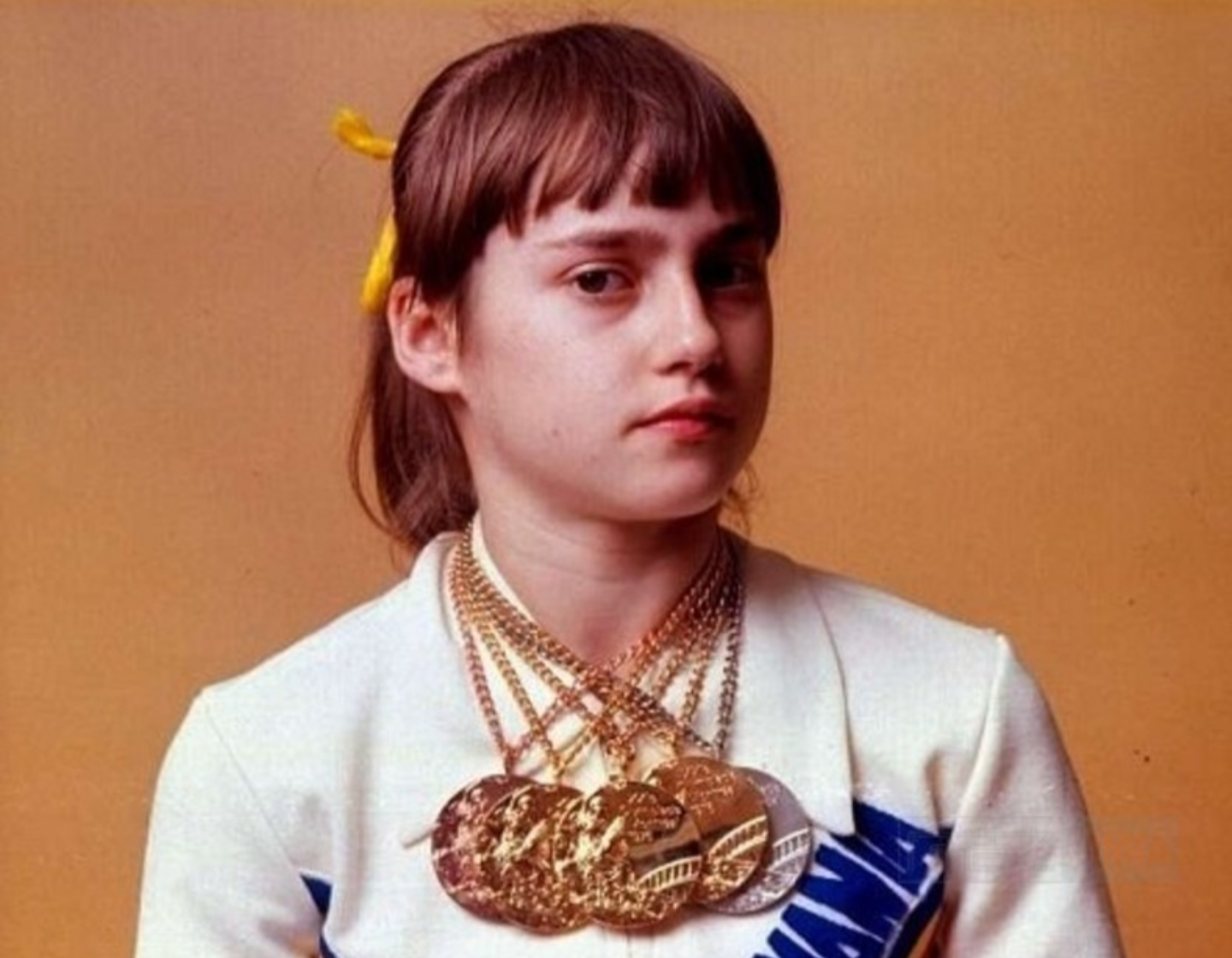 历史# 1976年第21届奥运会上,高低杠比赛时,来自罗马尼亚的科马内奇