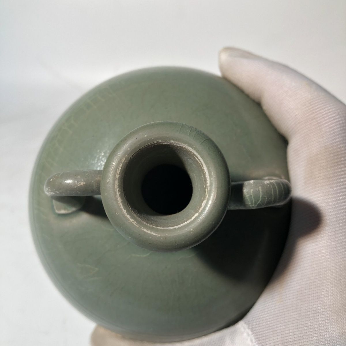 唐越窑青瓷低温釉陶弦纹双系梅瓶