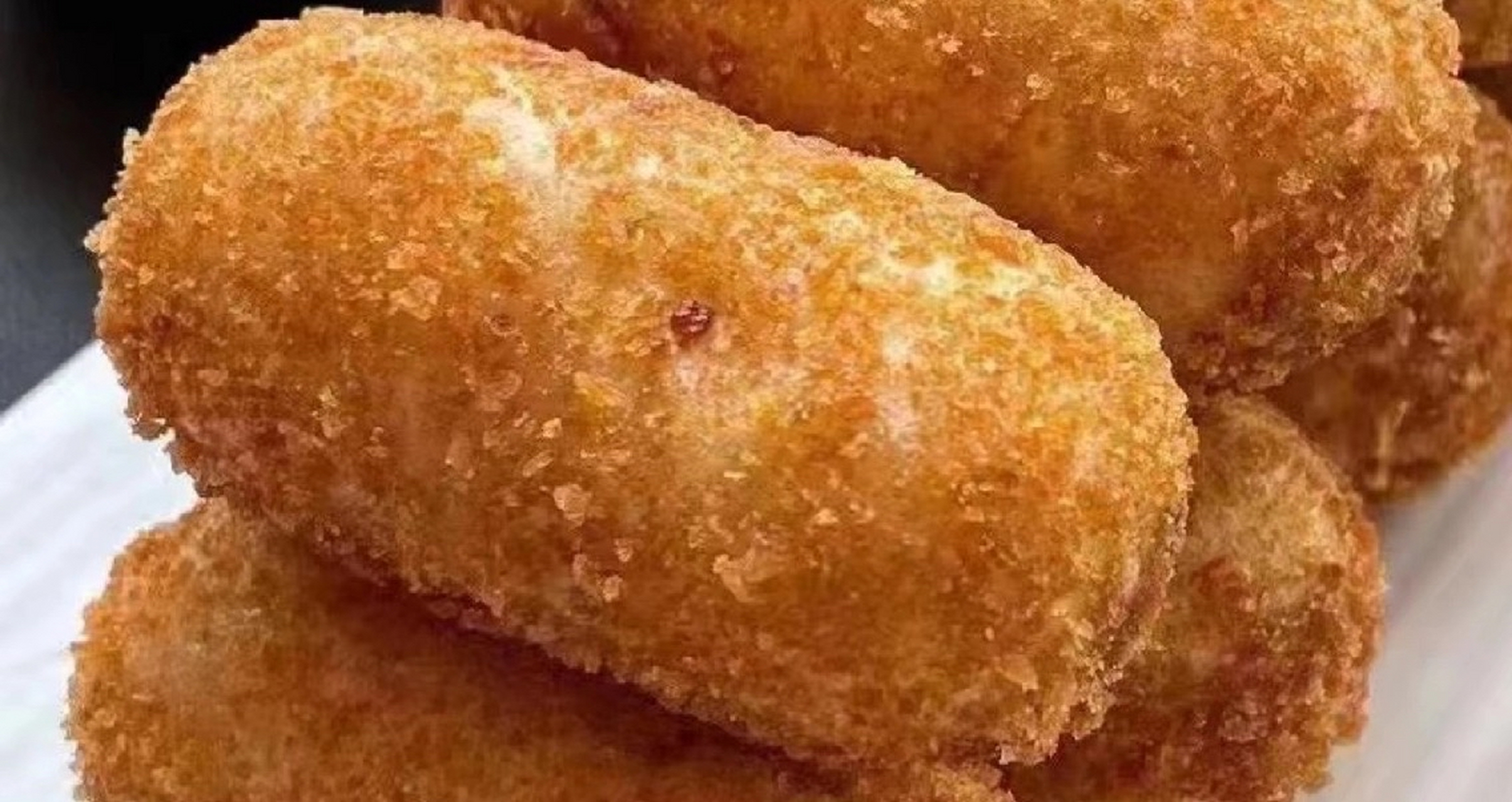 这个糍粑炸四五分钟就可以吃了.