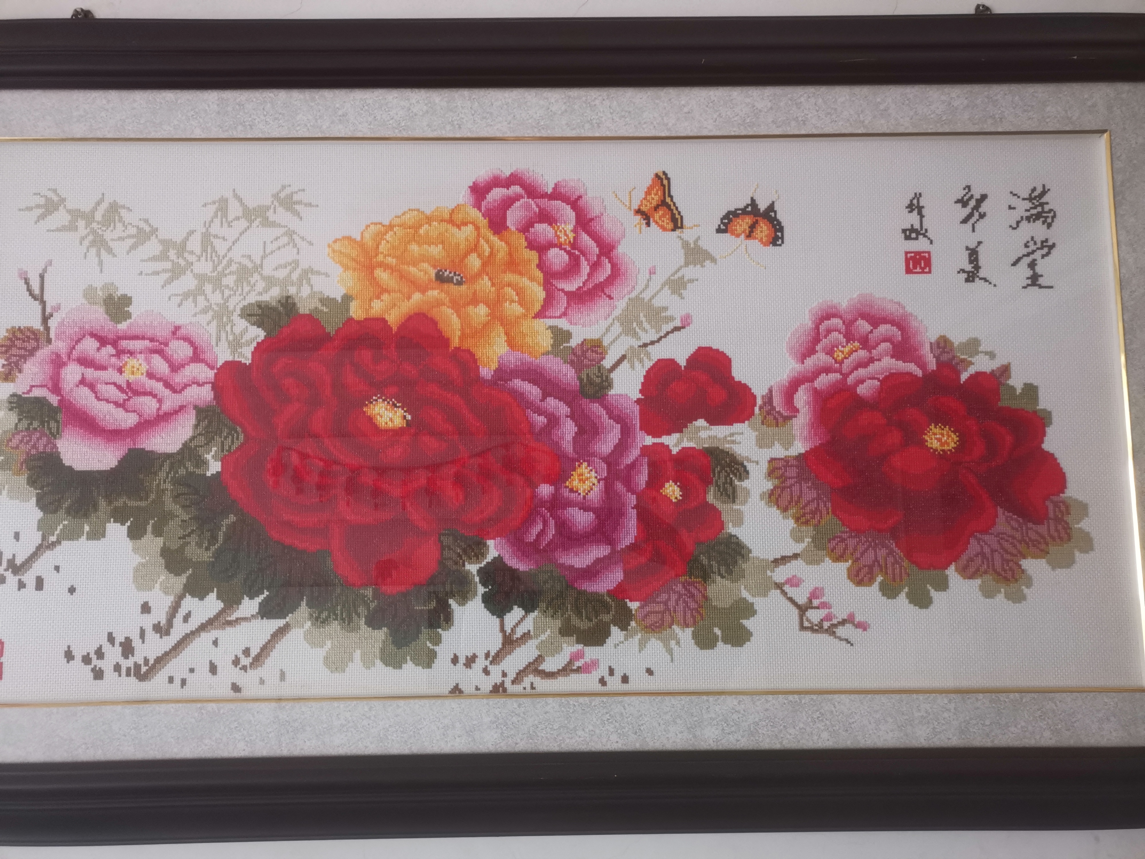 当年盛行"十字绣",开了很多十字绣店,于是就去各家店里挑选喜欢的绣