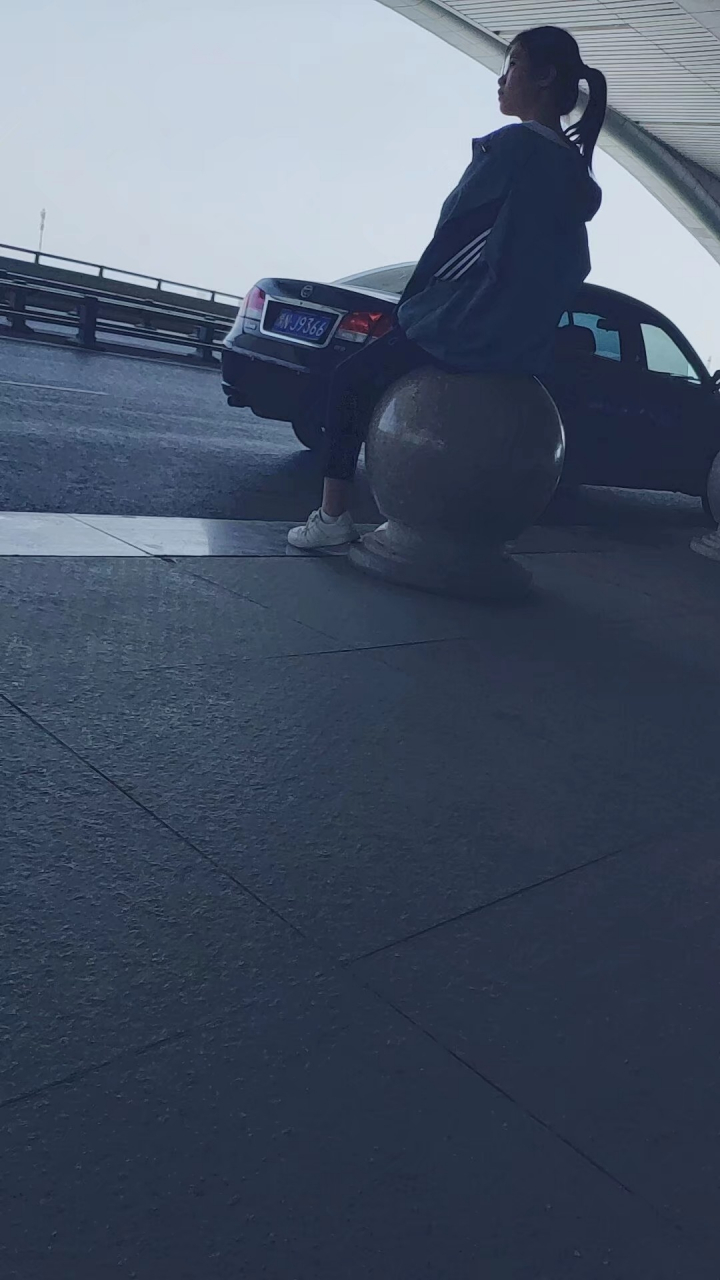 she is in the throes of violent birth.