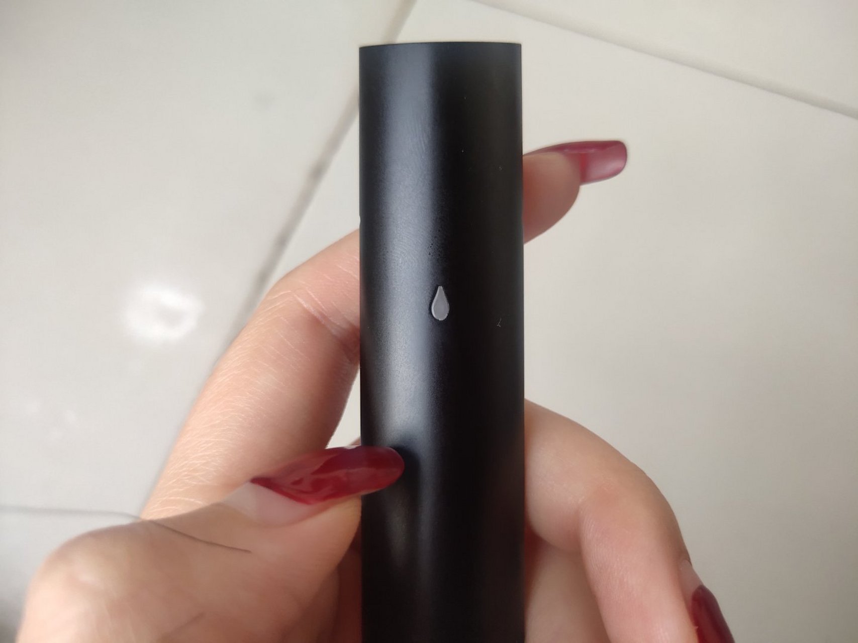 想问一下这个悦刻一代烟杆是假的还是真的,还有底部的代码,请问有谁